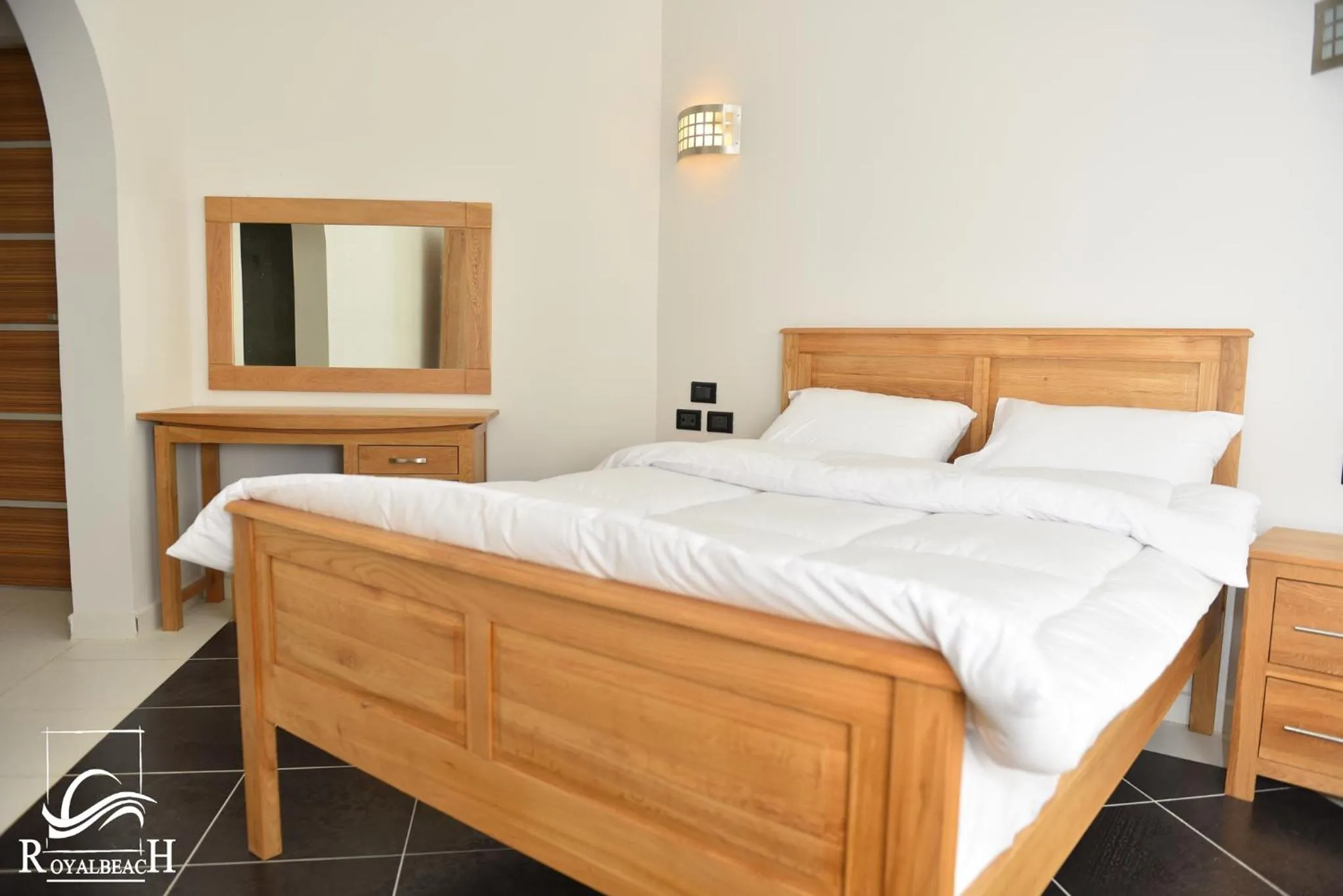 Bed in Royal Beach Serviced Apartments