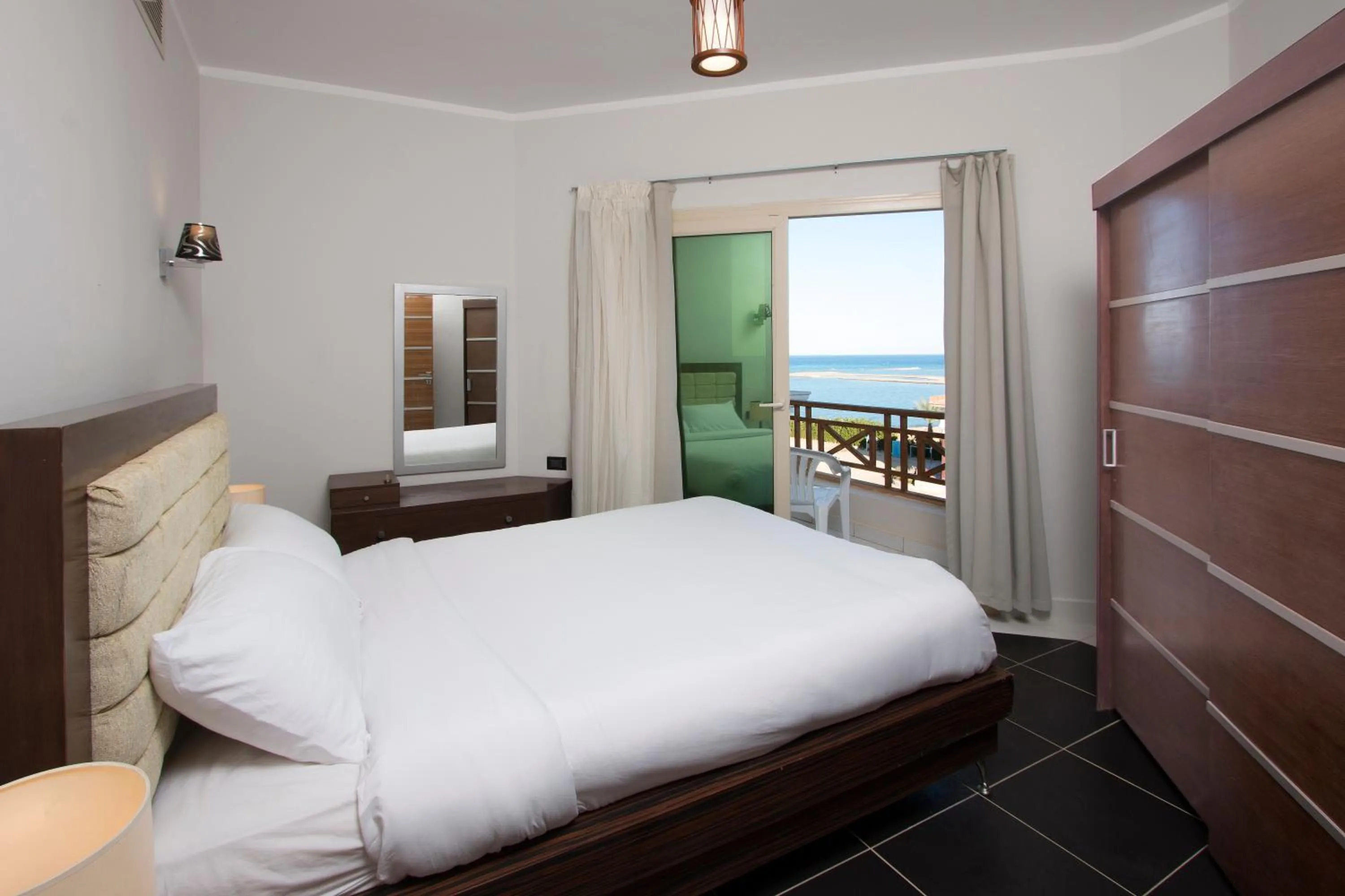 Bed in Royal Beach Serviced Apartments