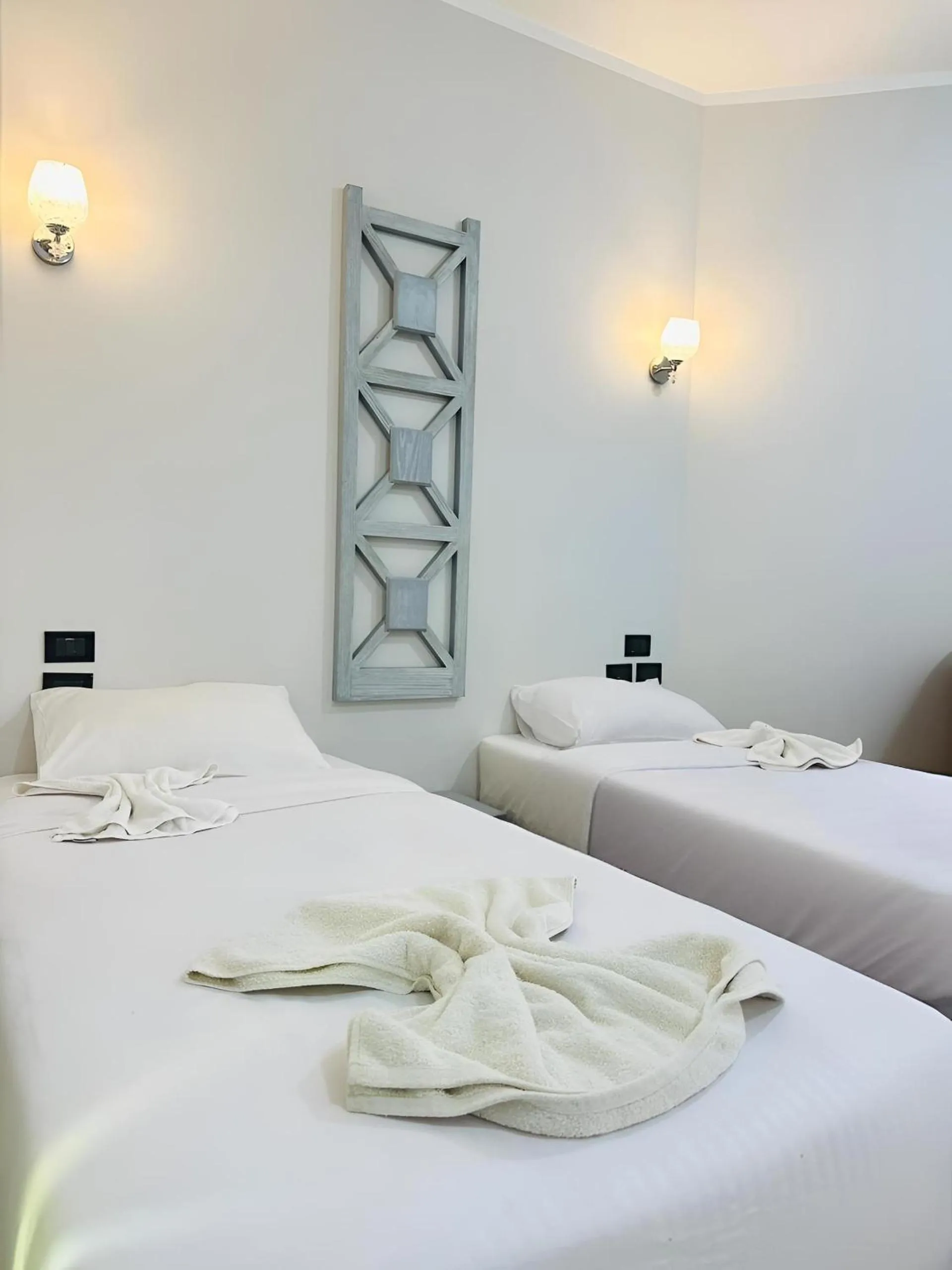 Bed in Royal Beach Serviced Apartments