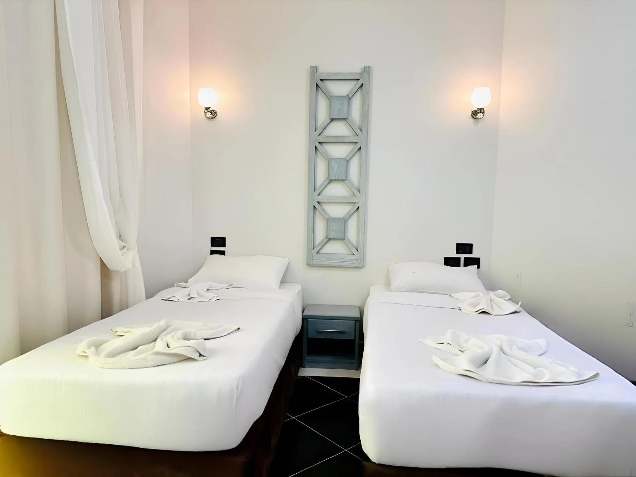 Bed in Royal Beach Serviced Apartments