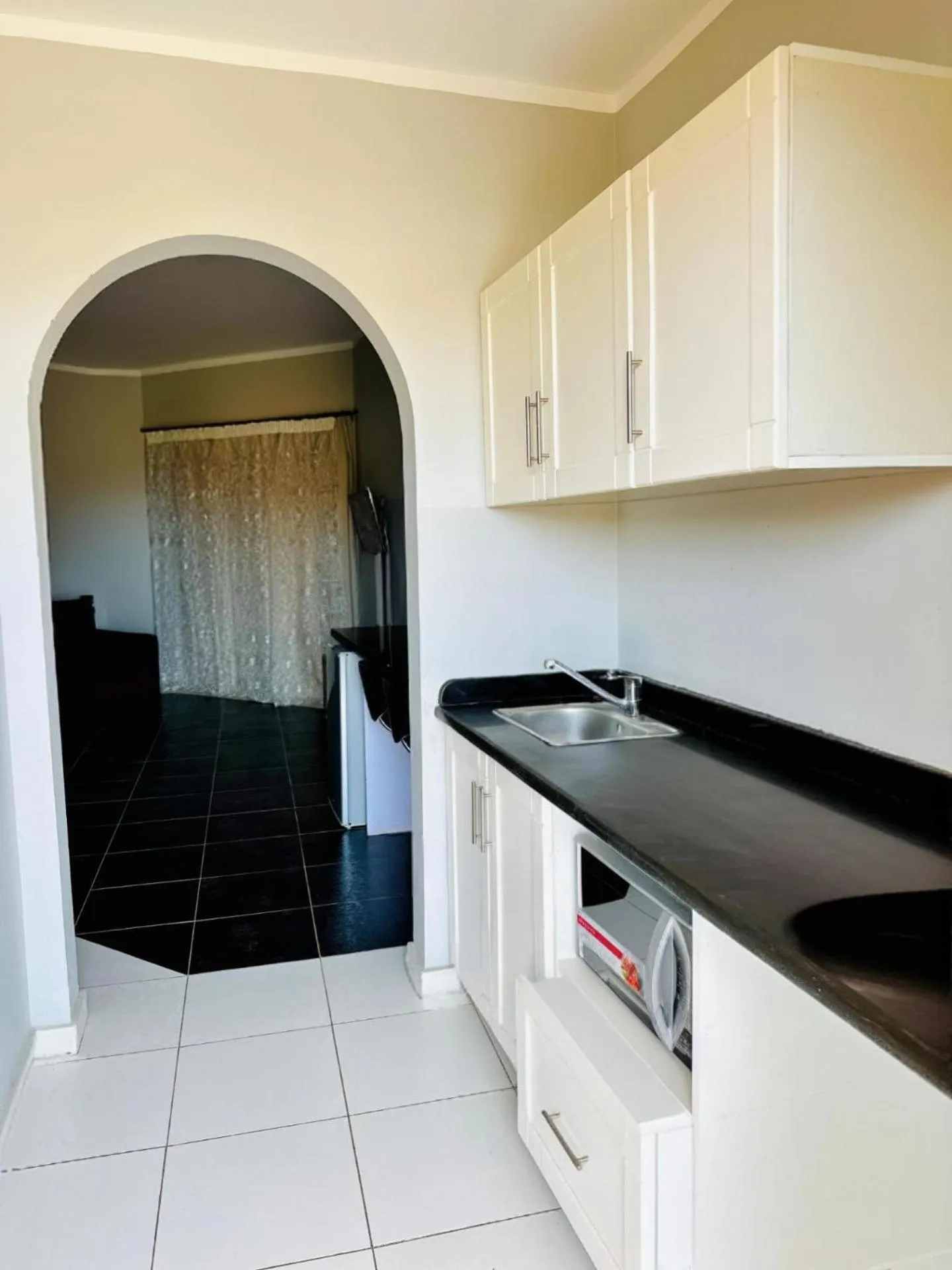 Kitchen or kitchenette in Royal Beach Serviced Apartments
