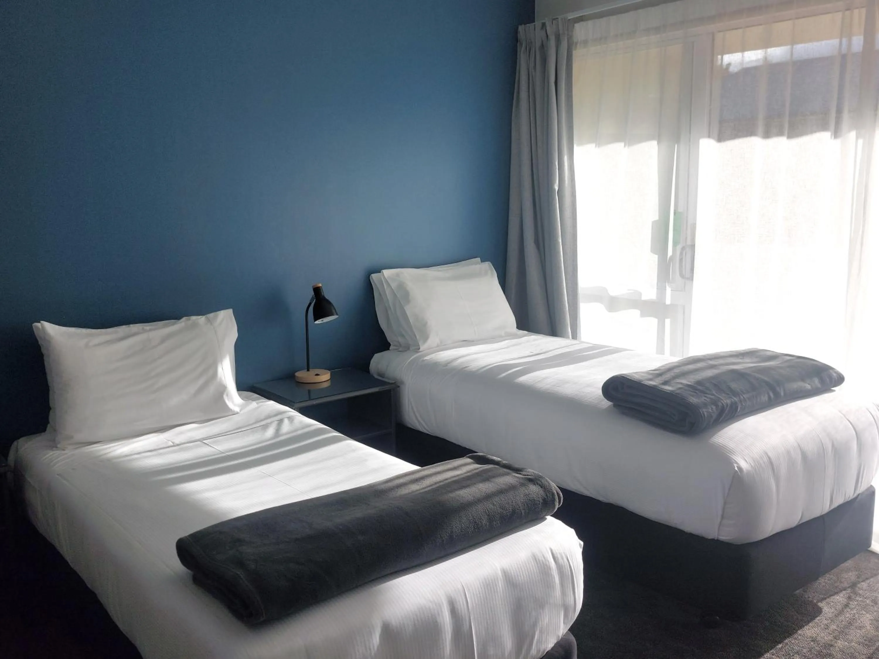 Bed in Lake Dunstan Motel