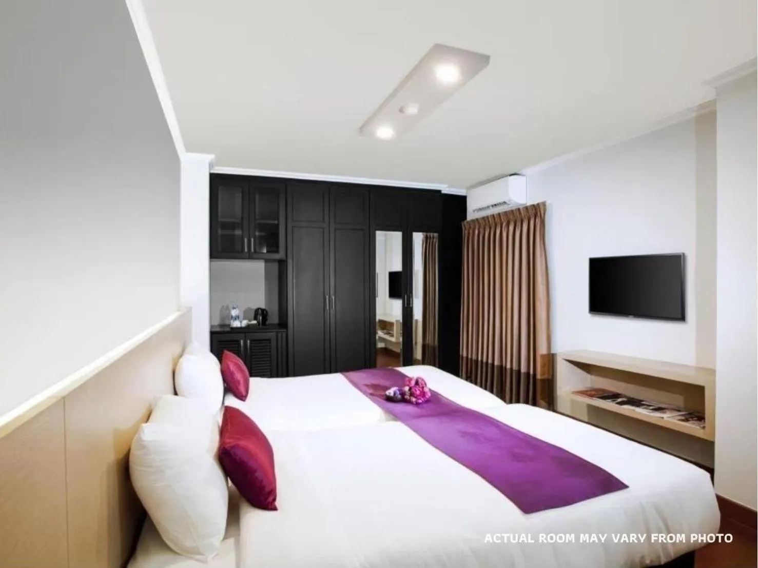 Photo of the whole room, Bed in The Step Sathon