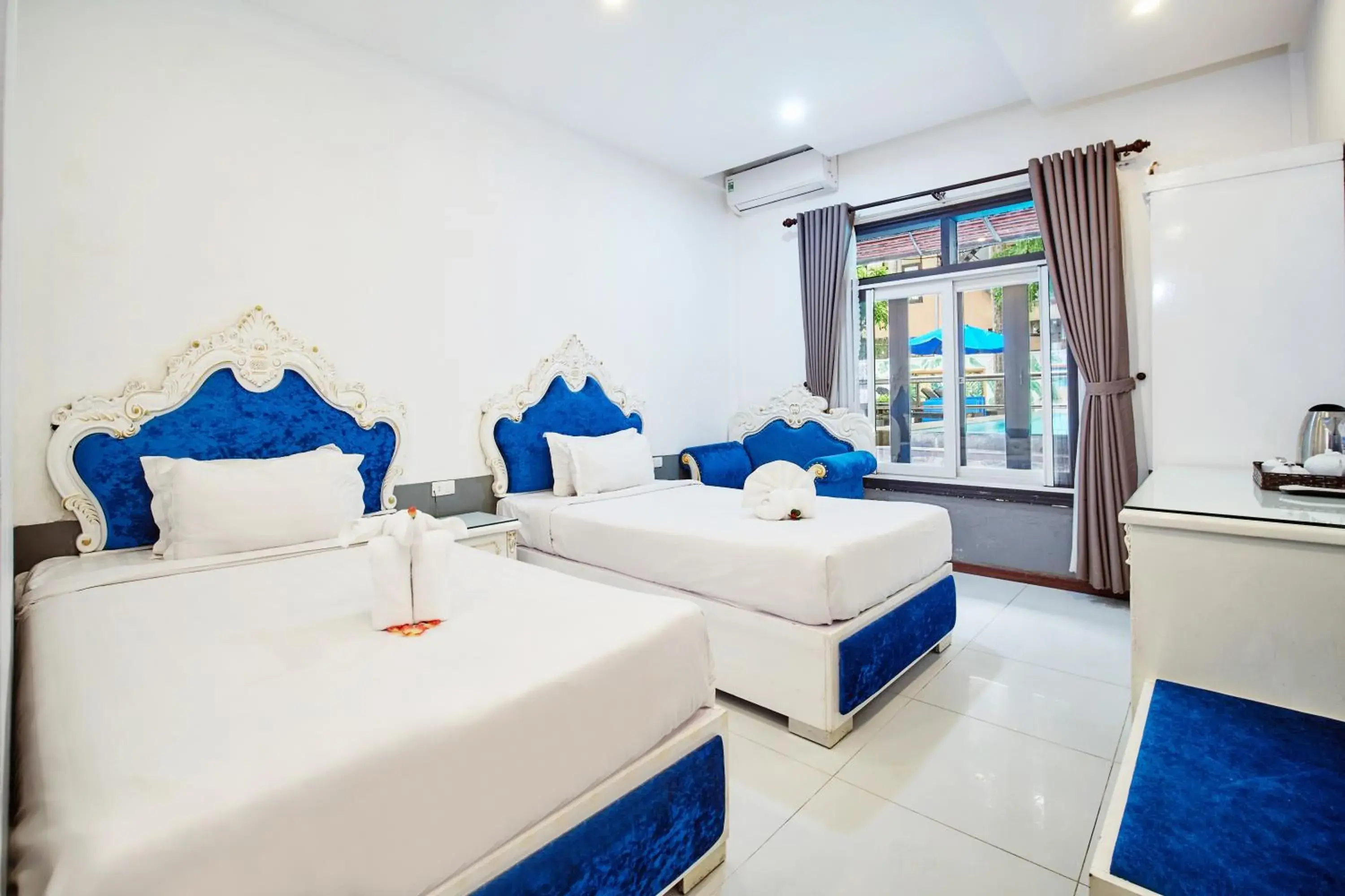 Twin Room with Pool View in Nostalgia Hotel and Spa Twin Room with Pool View in Nostalgia Hotel and Spa