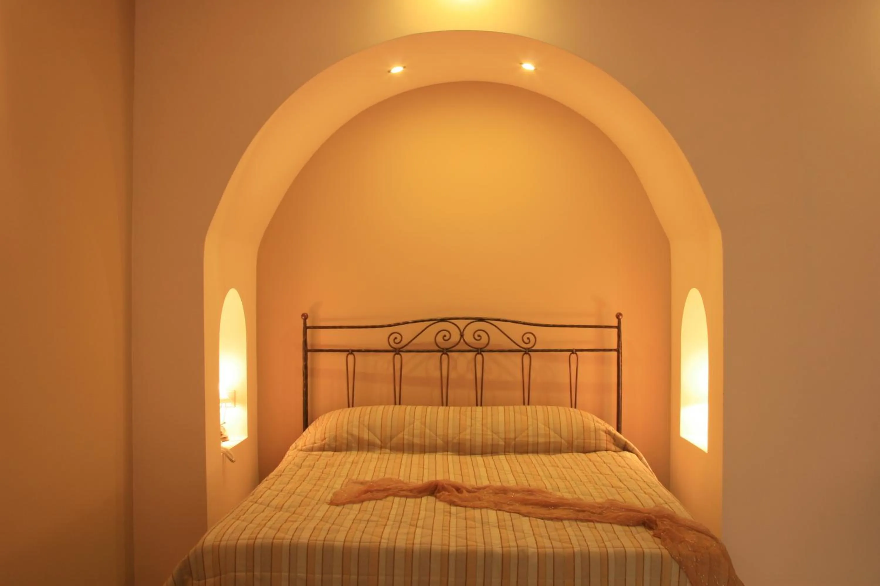 Bedroom in Anassa Deluxe Suites