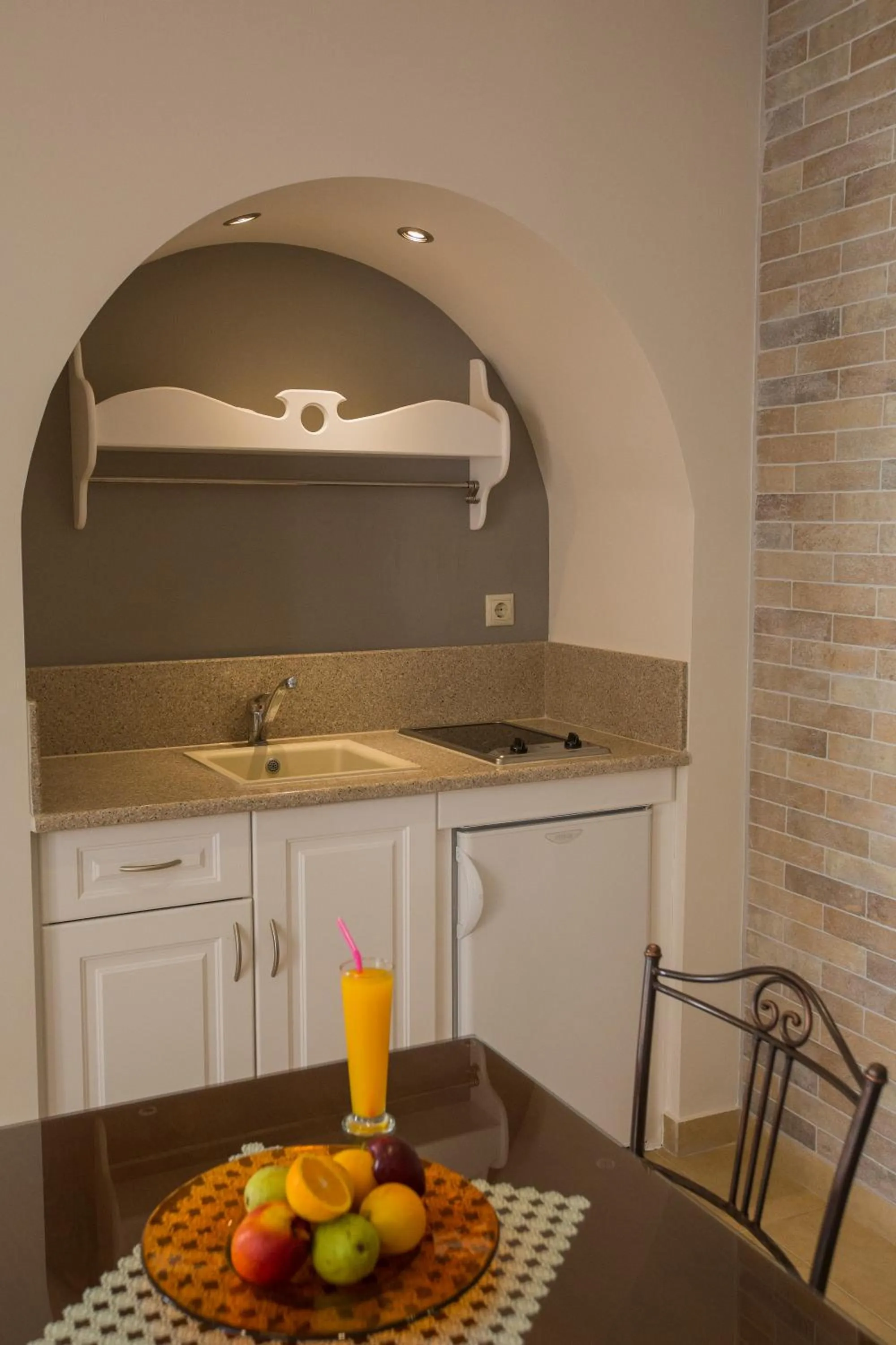 Kitchen or kitchenette in Anassa Deluxe Suites