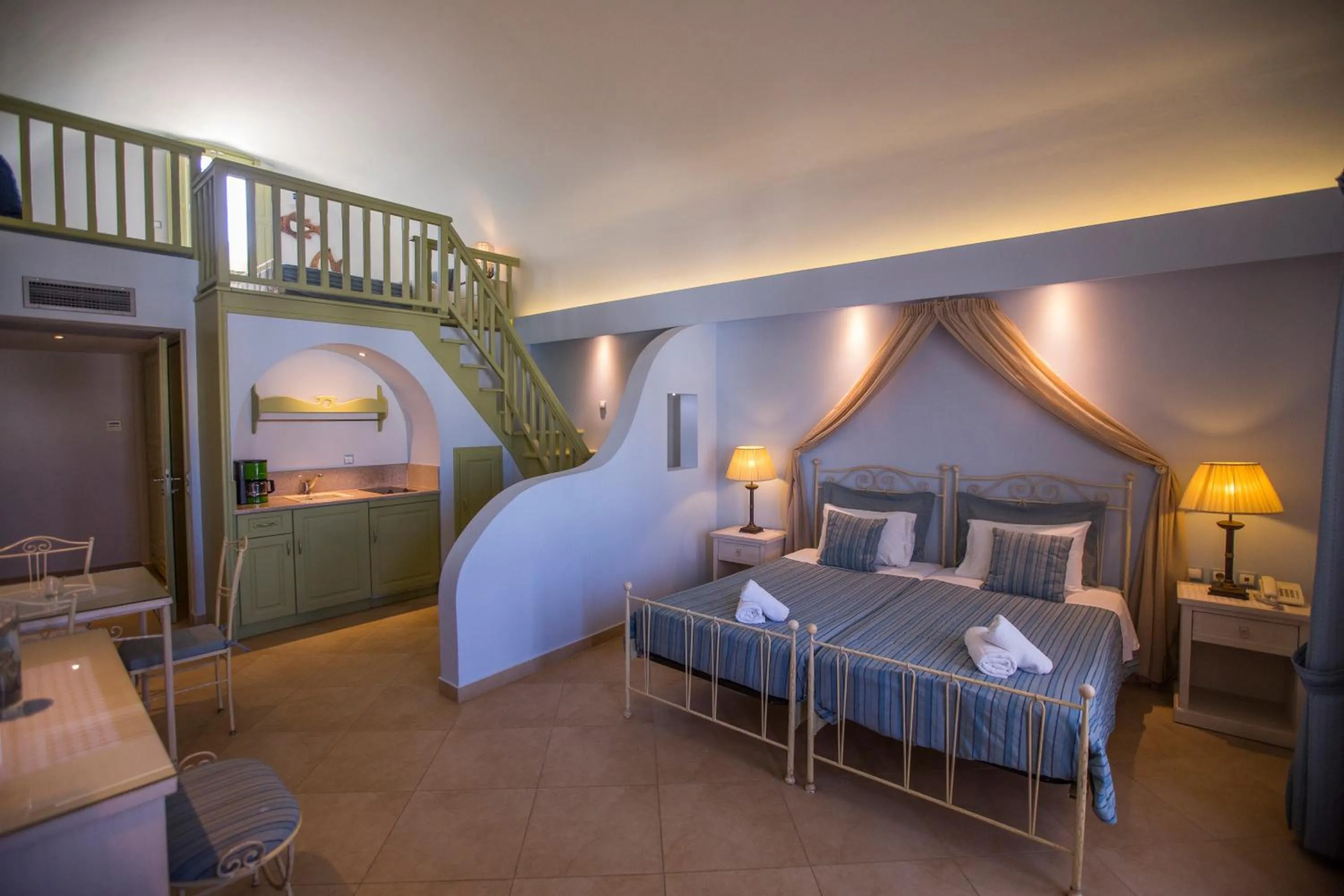 Bedroom in Anassa Deluxe Suites