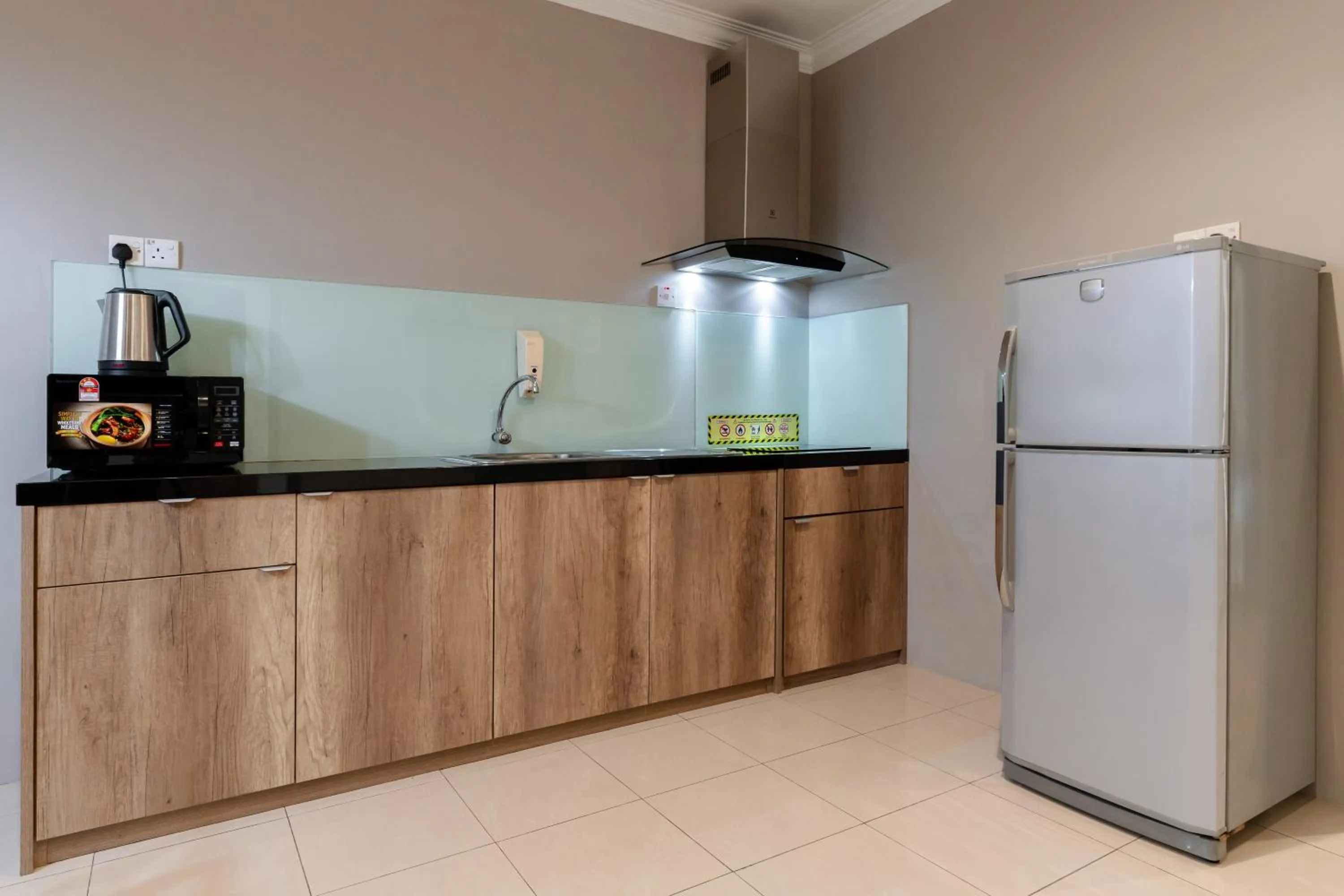 Kitchen or kitchenette in Golden View Serviced Apartments