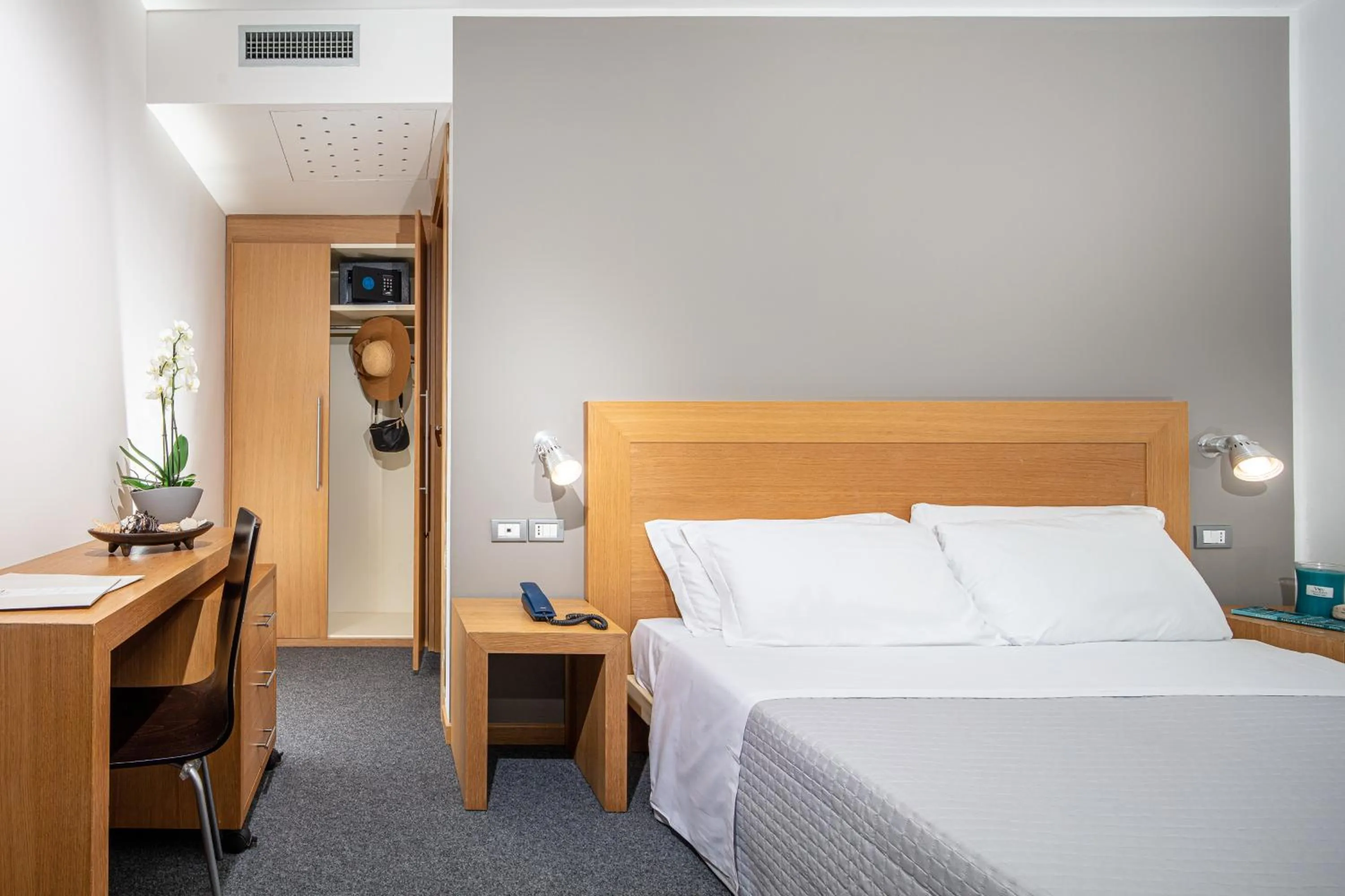 Bed in Hotel Martini