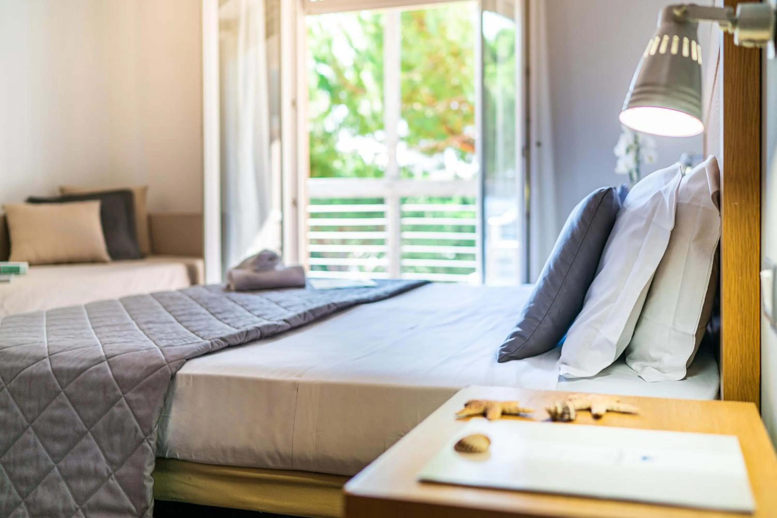 Swimming pool, Bed in Hotel Martini