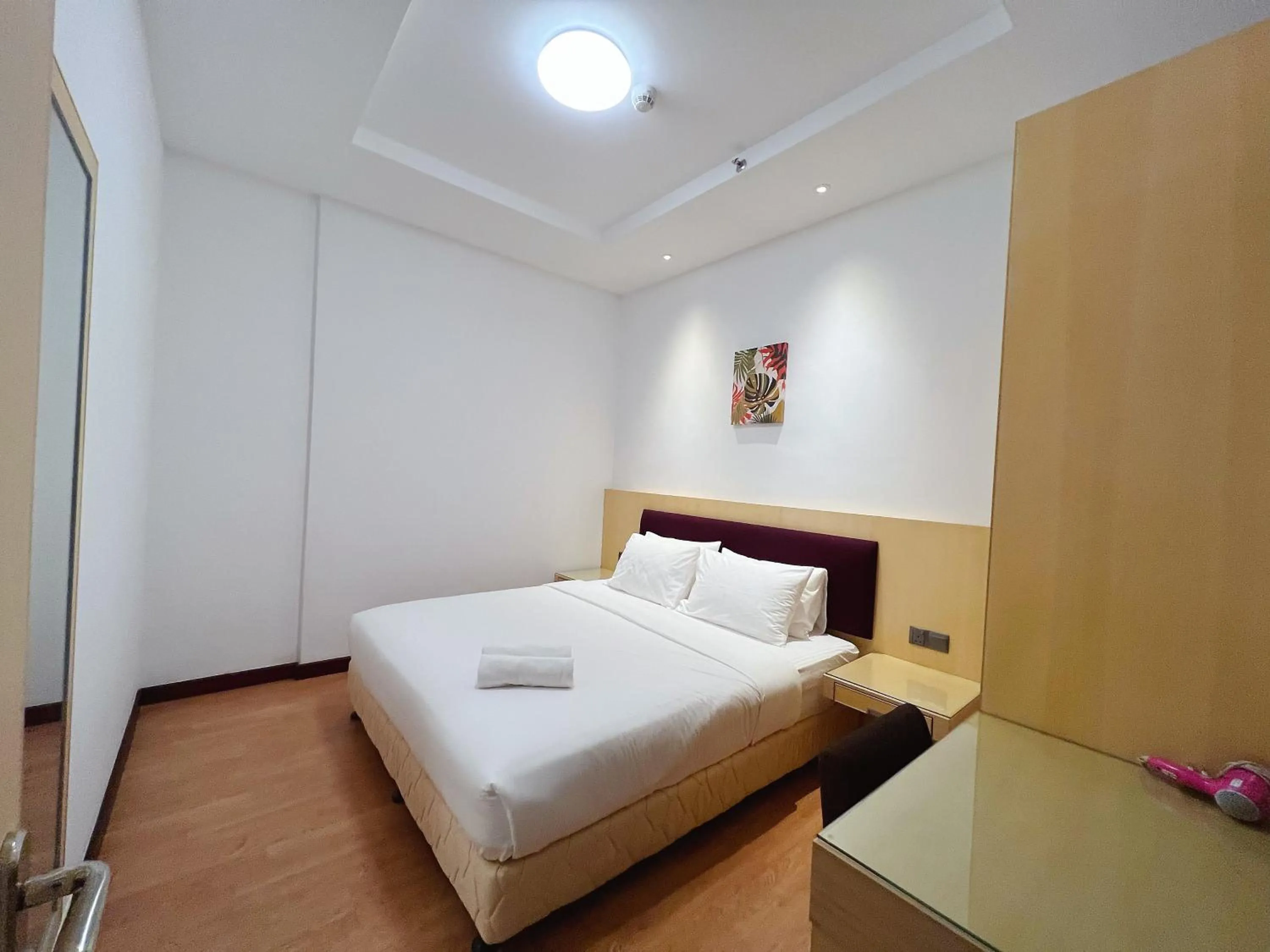 Bed in Imperial Grand Suite Apartment Kuching