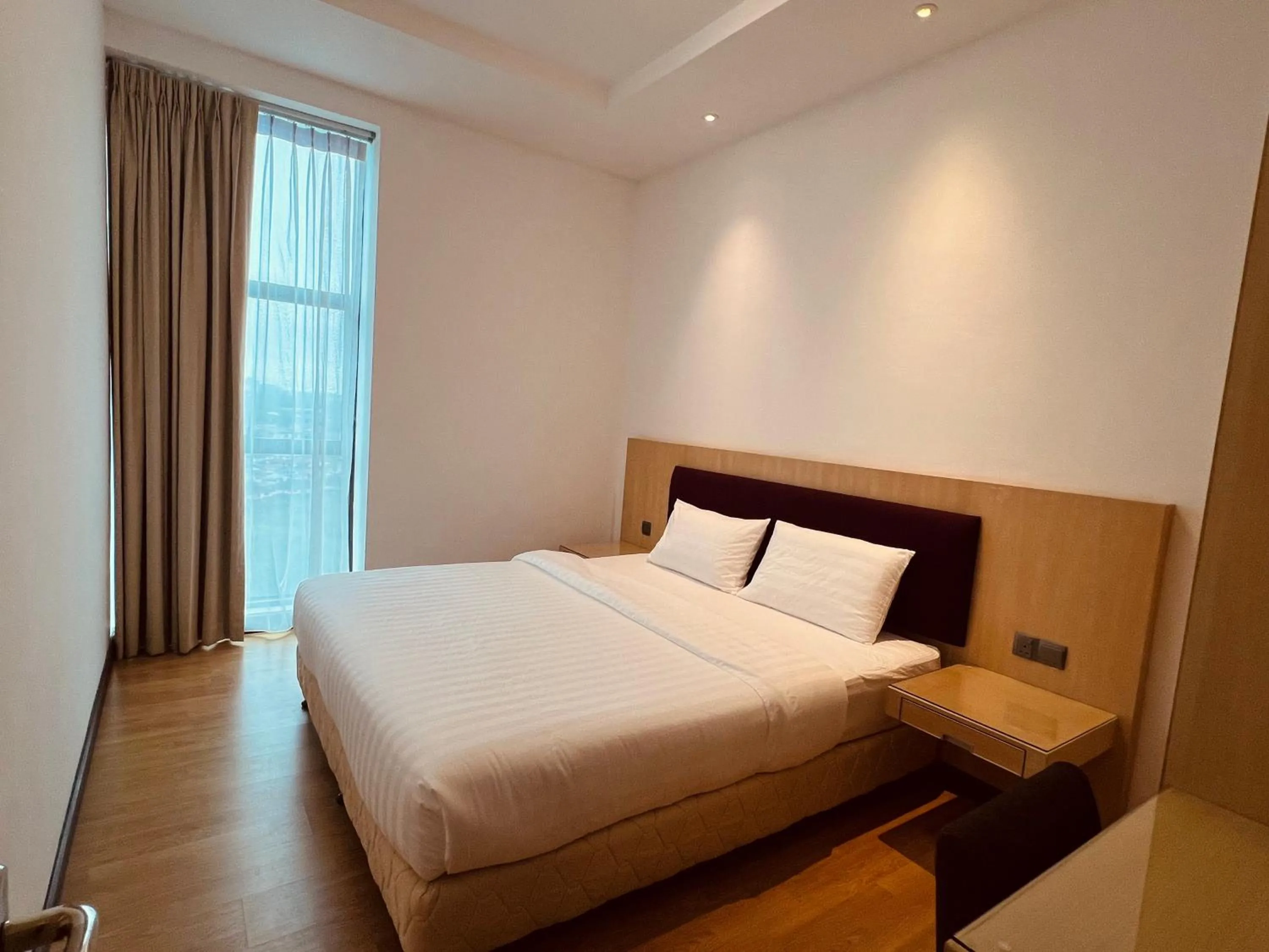 Bed in Imperial Grand Suite Apartment Kuching