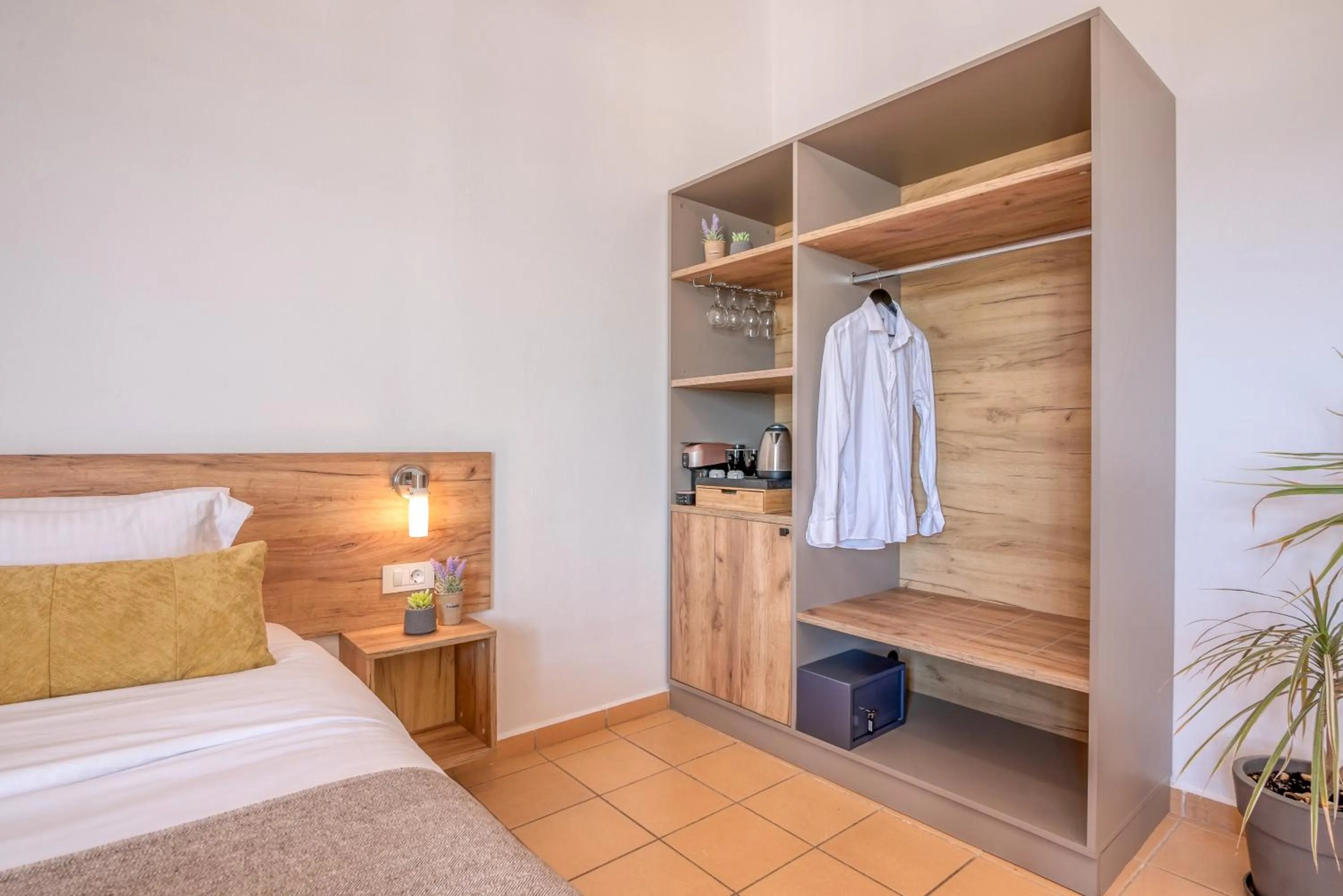 Bed in Kaliviani Traditional Hotel