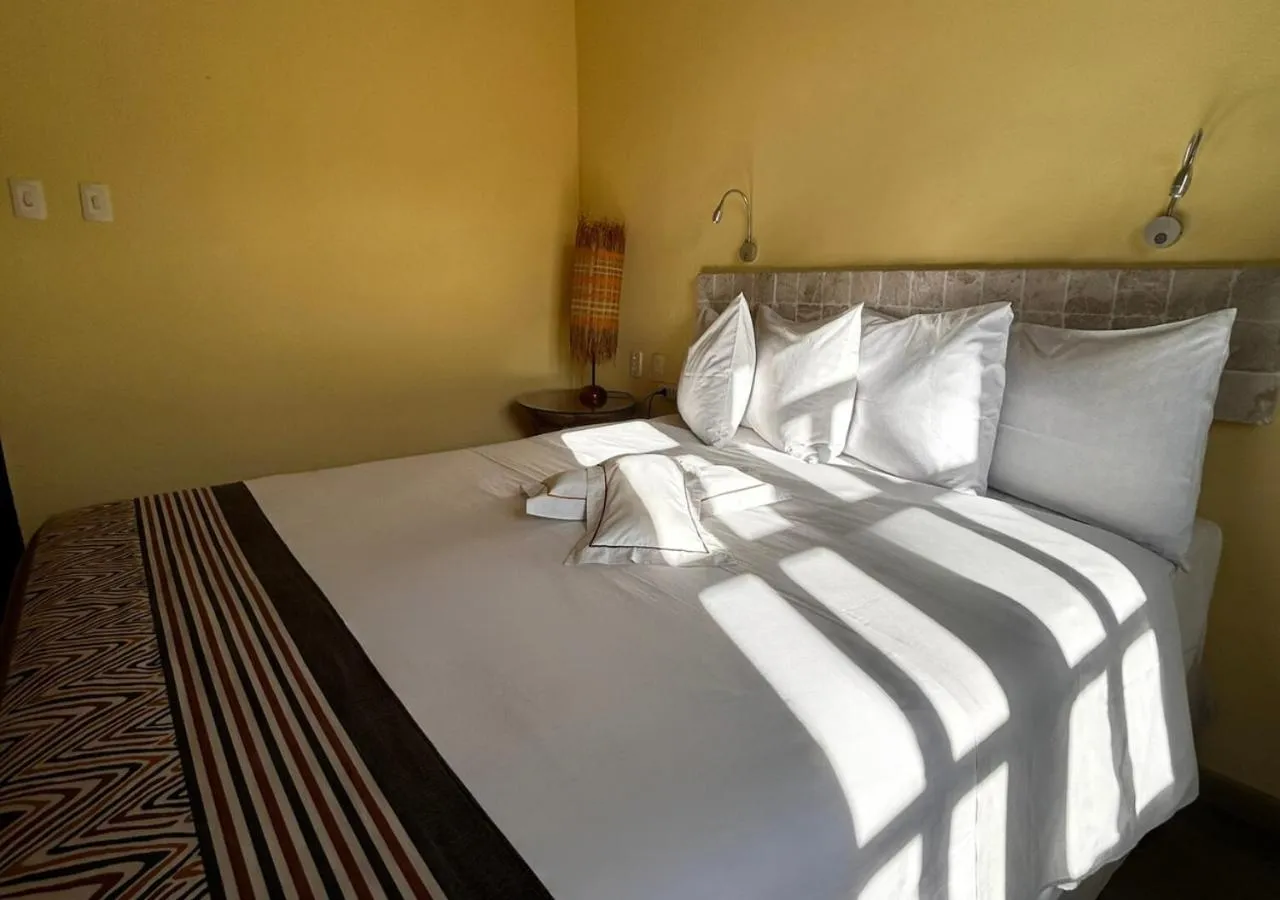 Bed in Bahiacafé Hotel