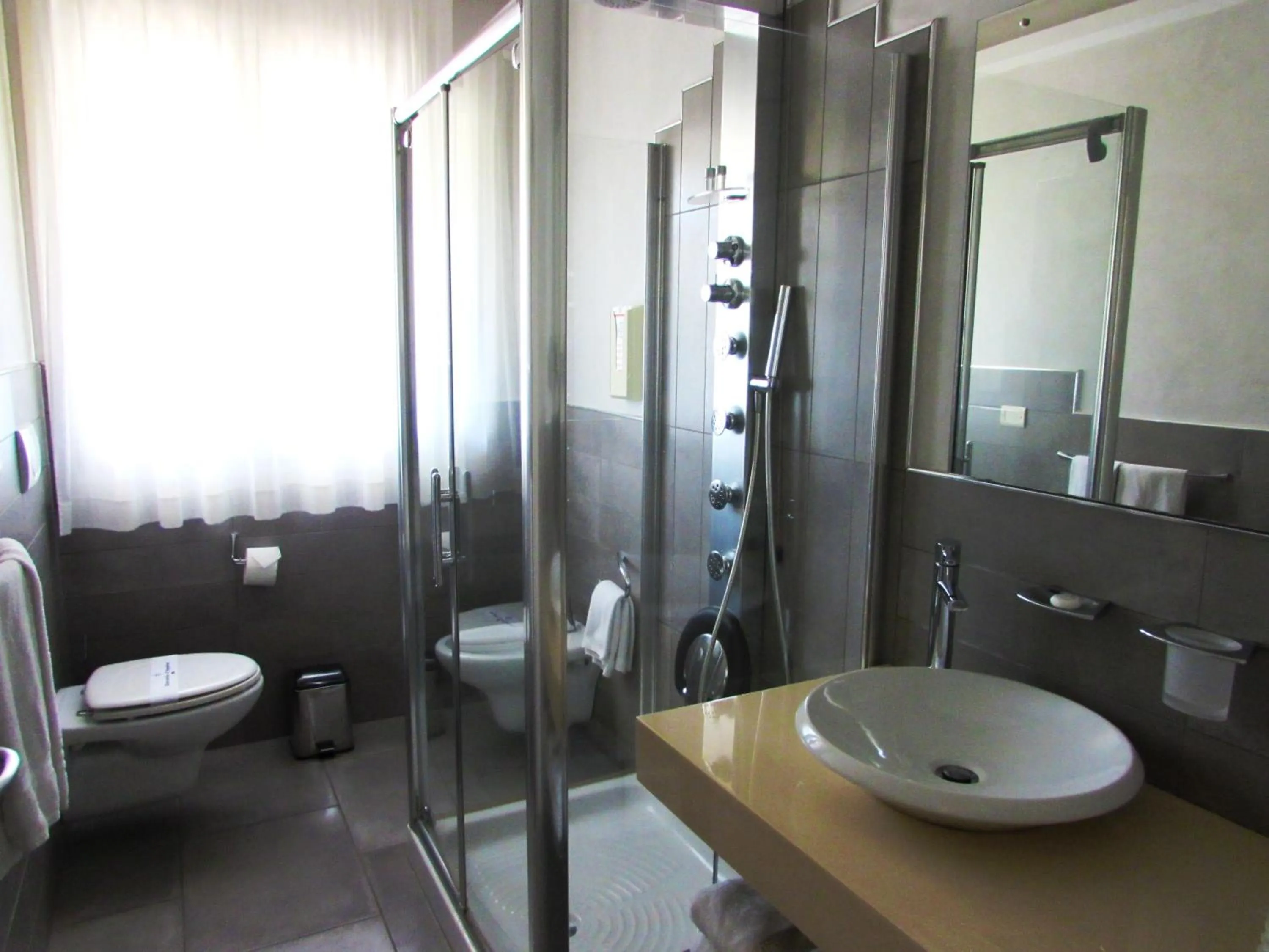 Bathroom in Hotel Dante Residence