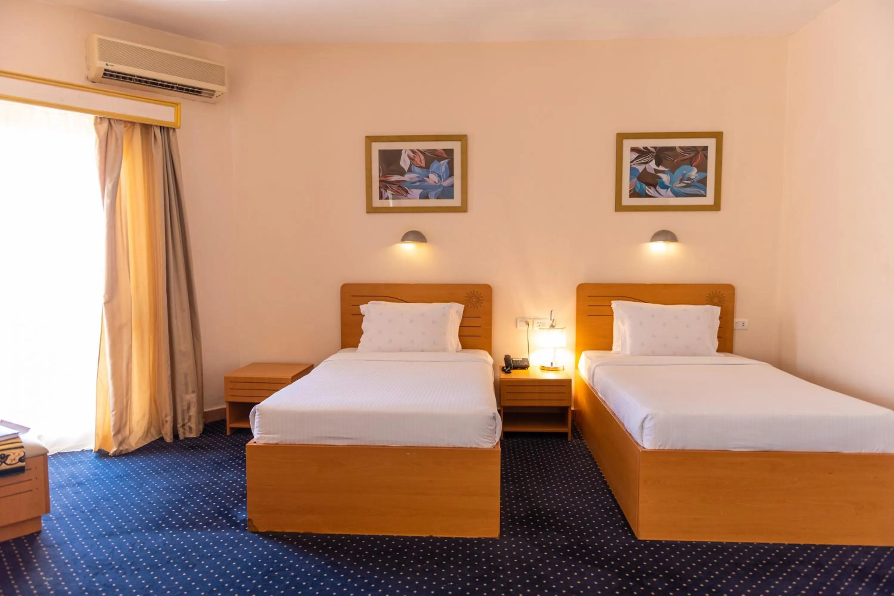 Bed in Tolip Family Club Borg El Arab