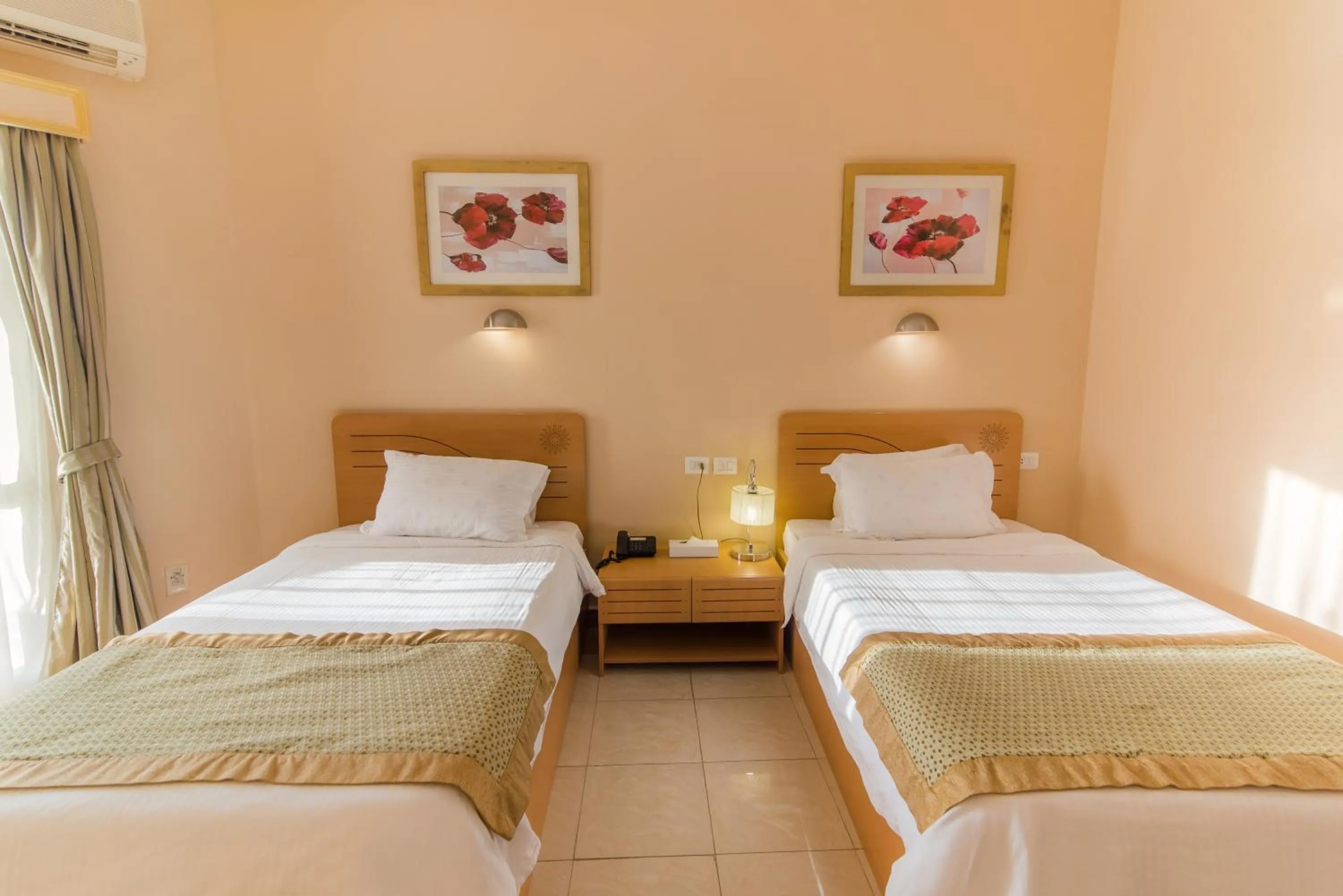 Bed in Tolip Family Club Borg El Arab