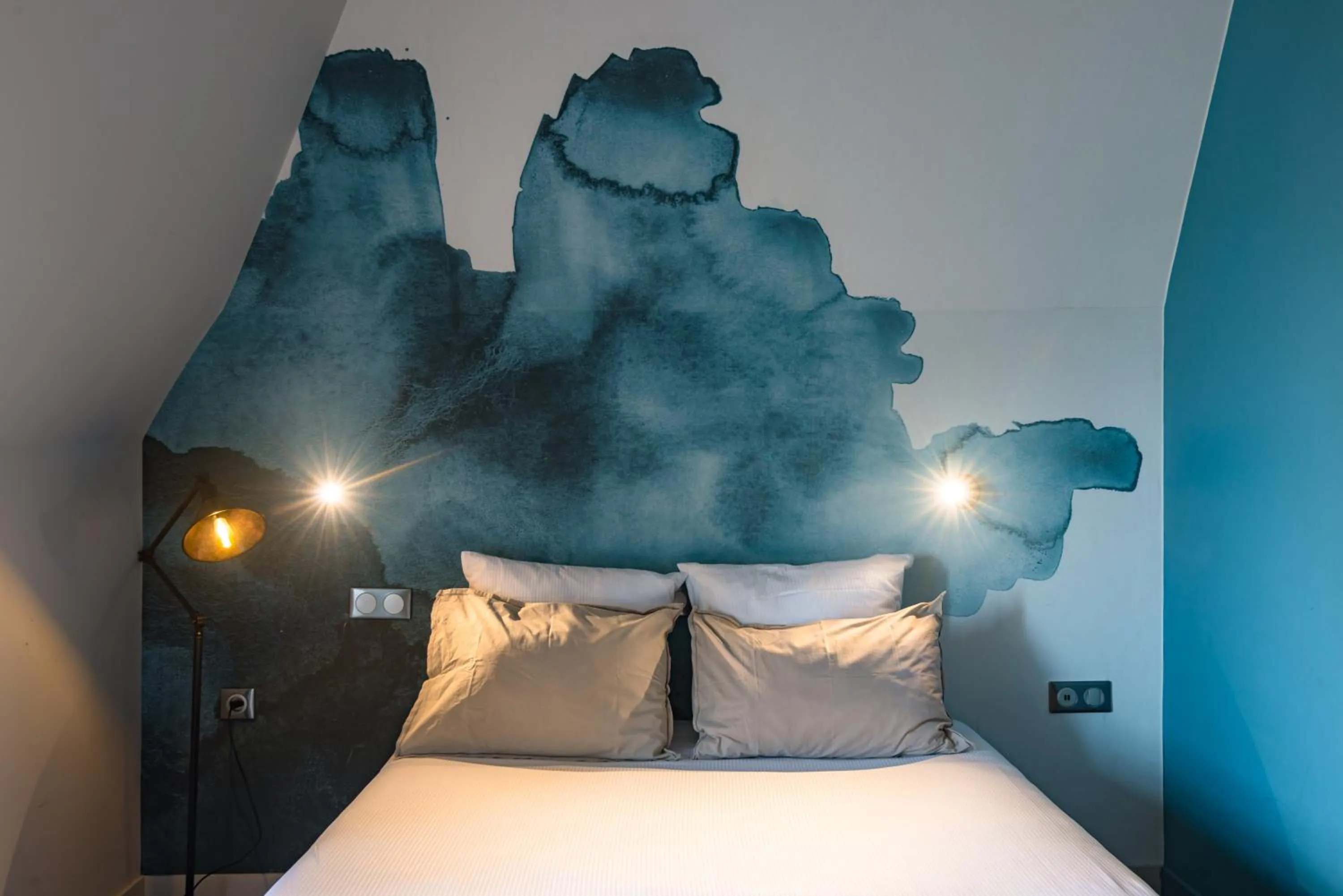 Bed in Hôtel de la Cité