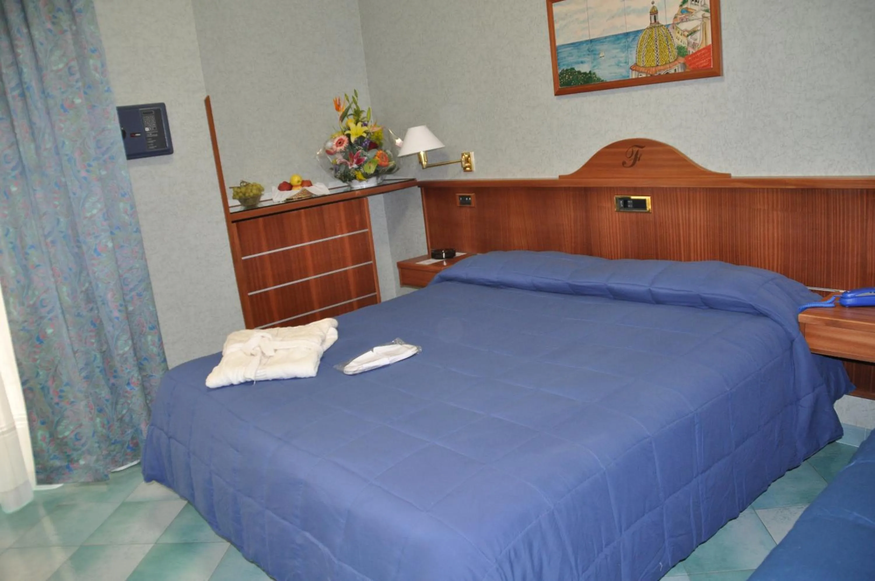 Bed in Albergo Fiorenza