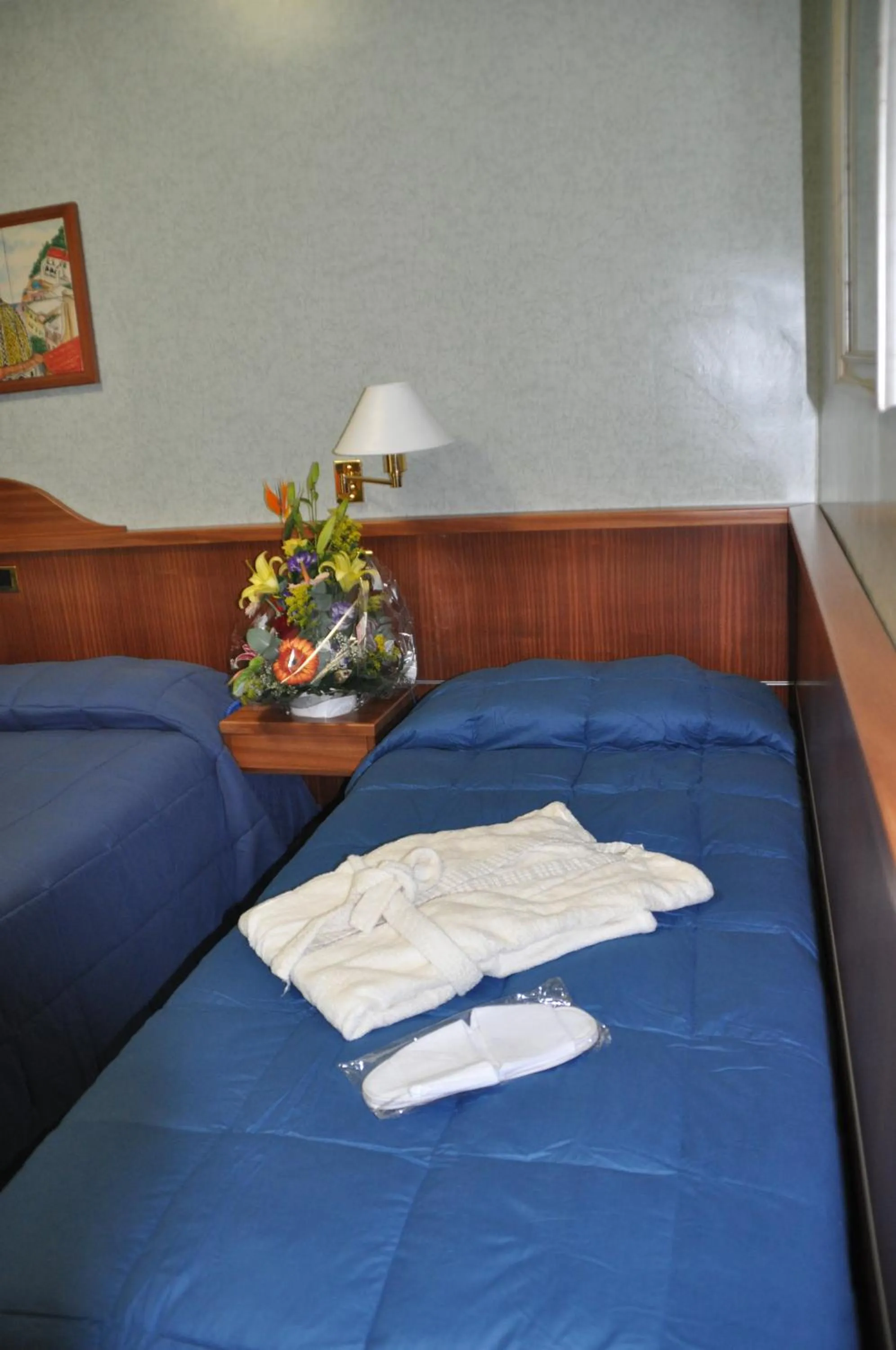 Bed in Albergo Fiorenza