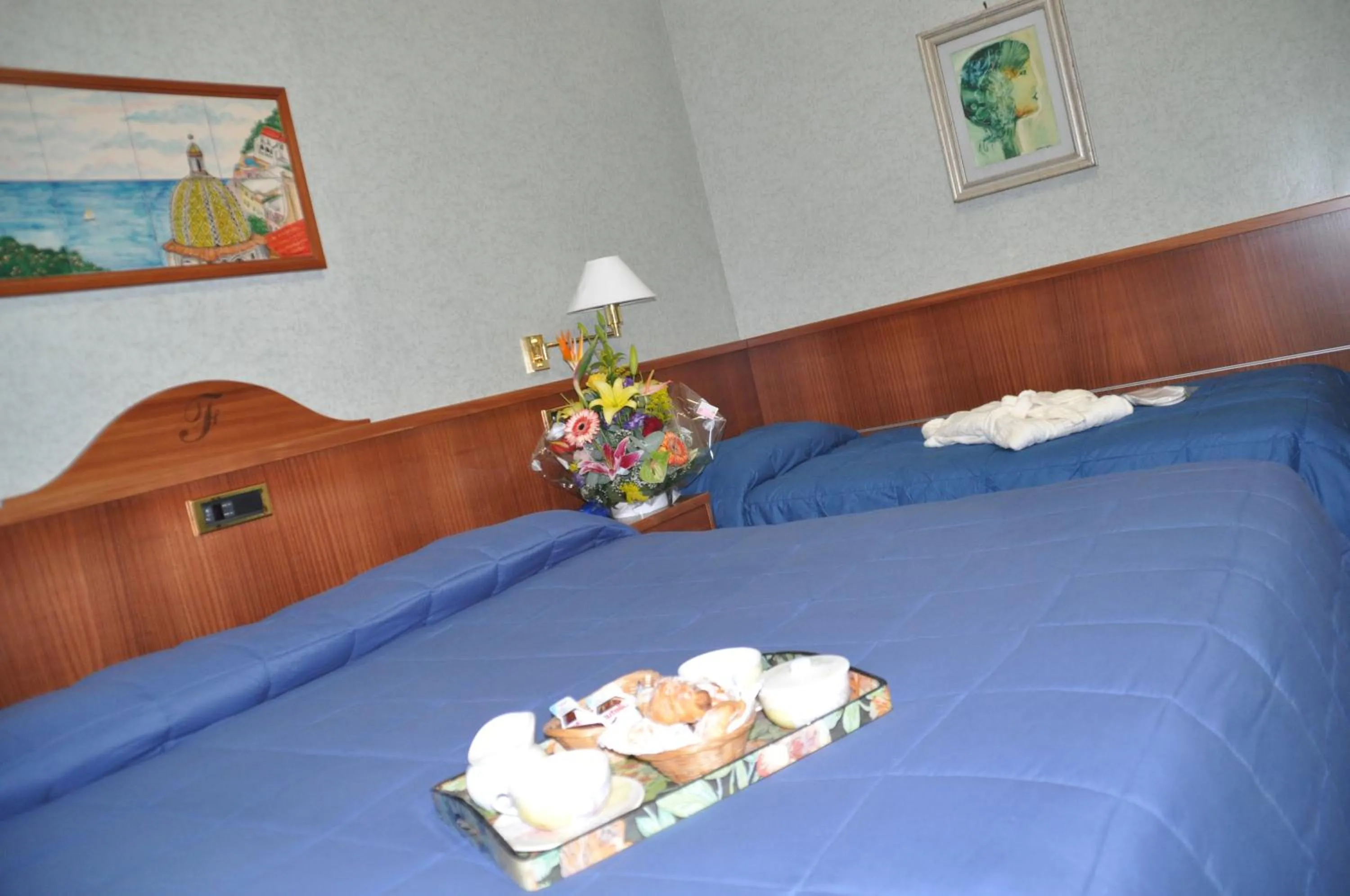 Bed in Albergo Fiorenza