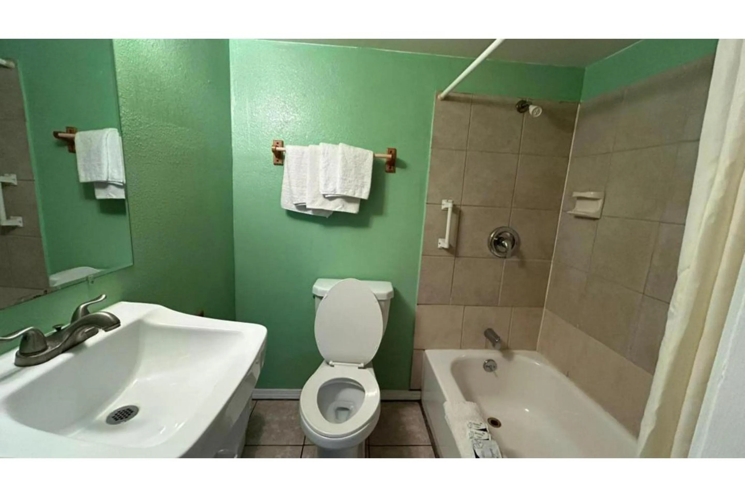 Bathroom in Monterrey Motel Padre Island, Corpus Christi BY OYO