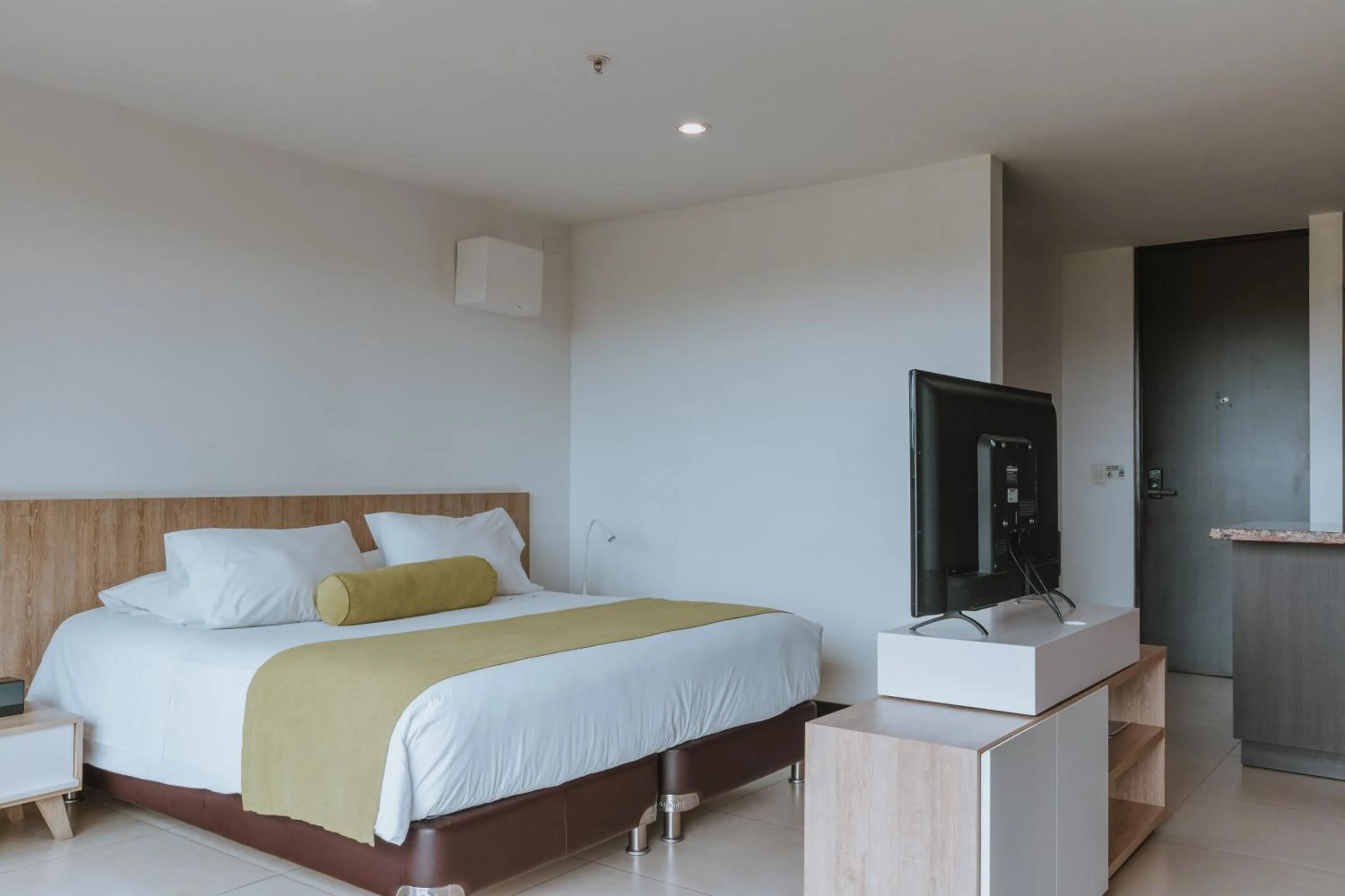 Bed in Travelers Rio Verde Living Suites