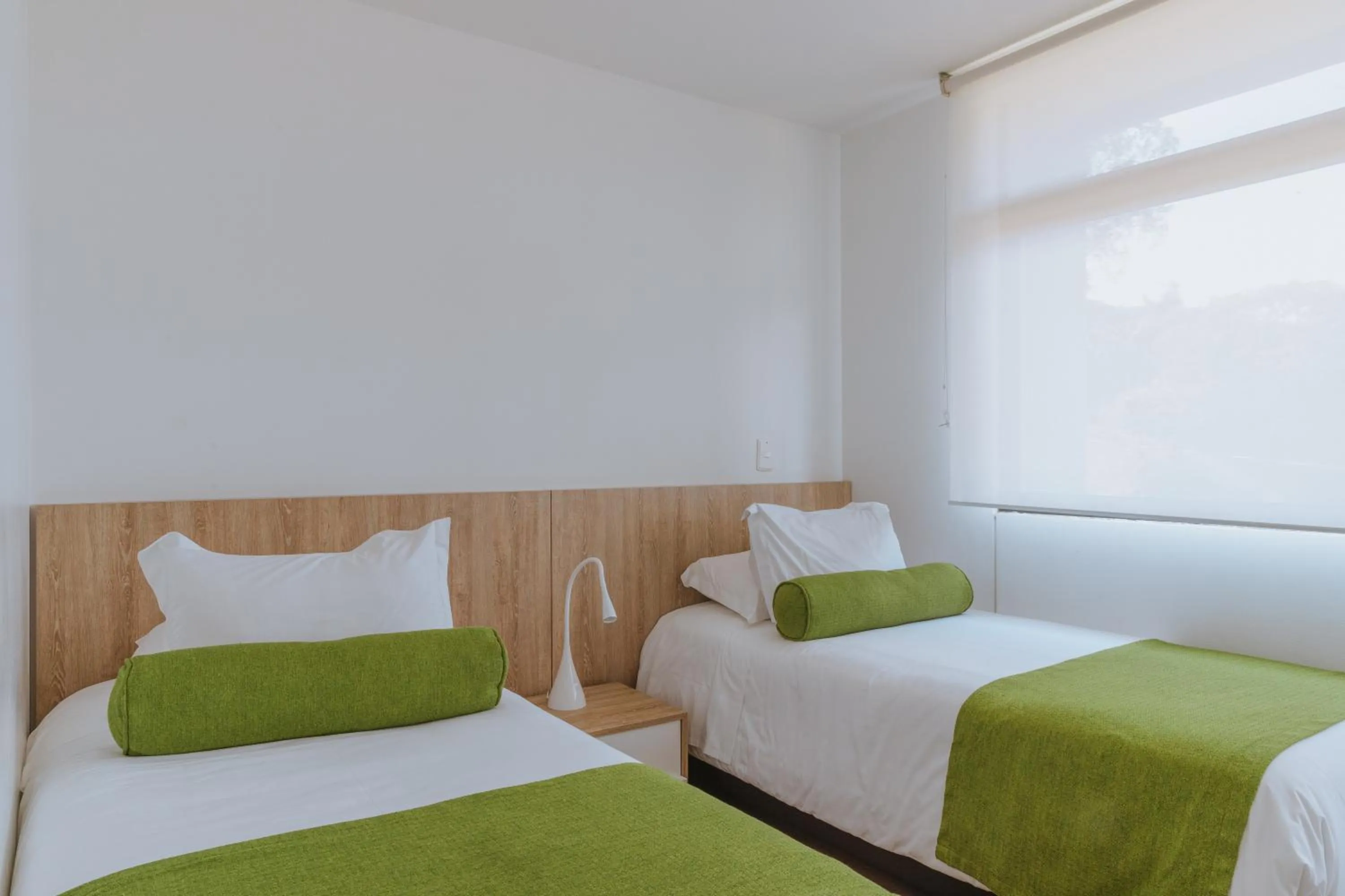 Bed in Travelers Rio Verde Living Suites