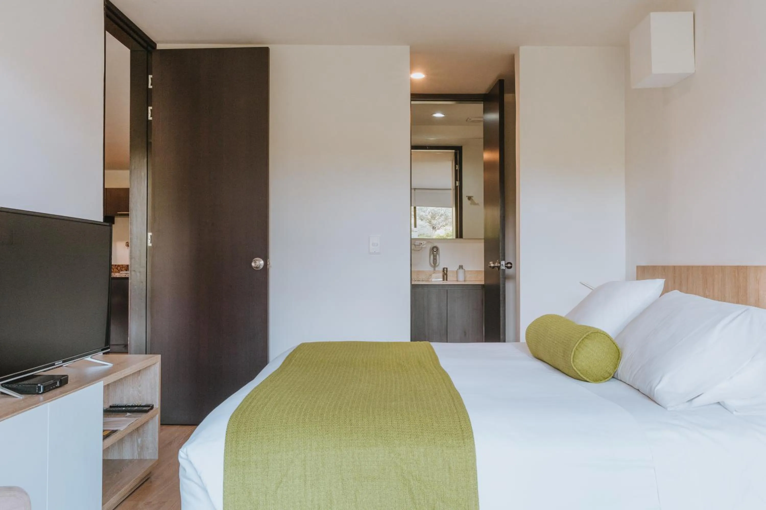 Bed in Travelers Rio Verde Living Suites