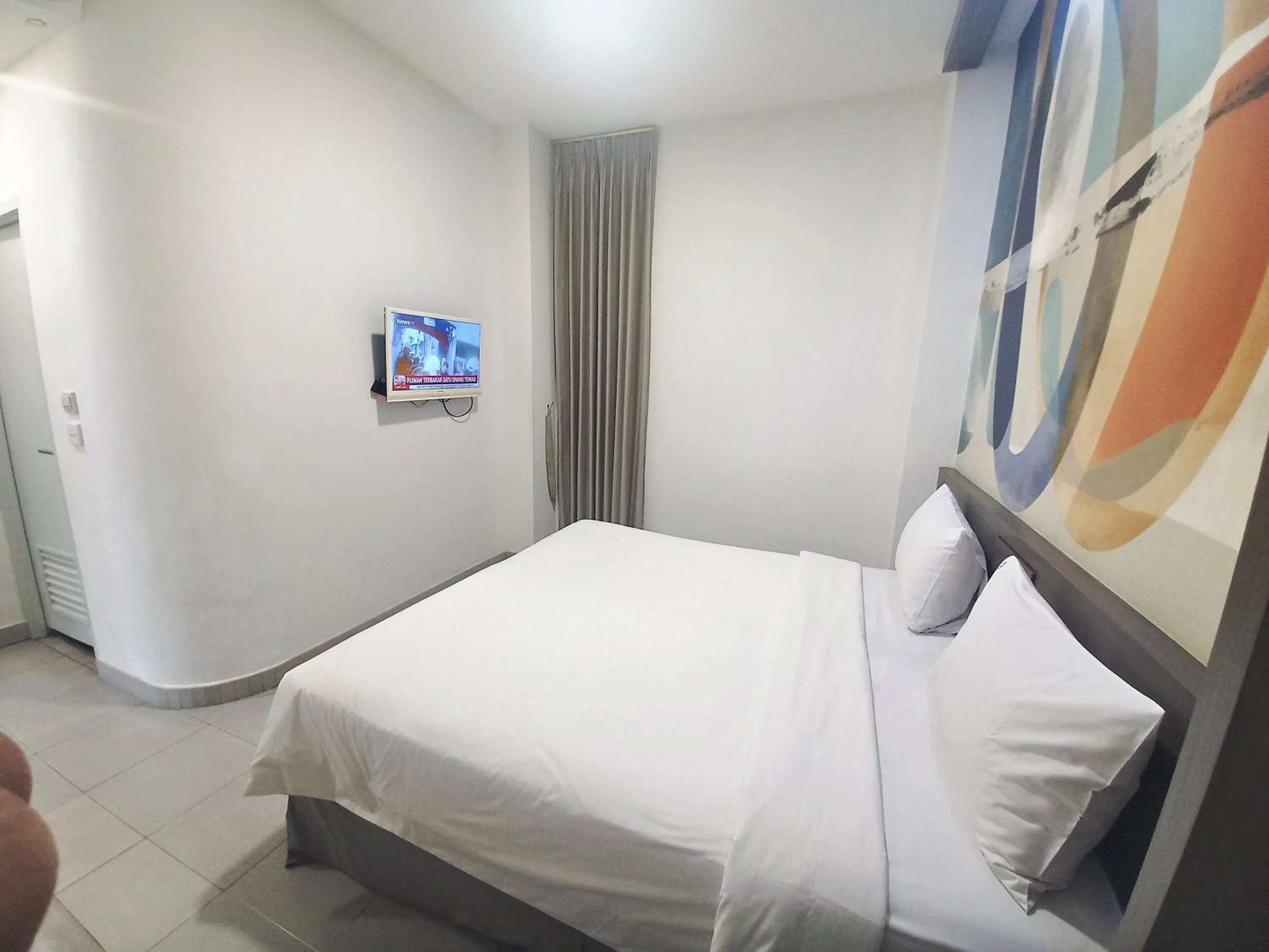 Bedroom, Bed in Hotel 88 Kedoya Jakarta