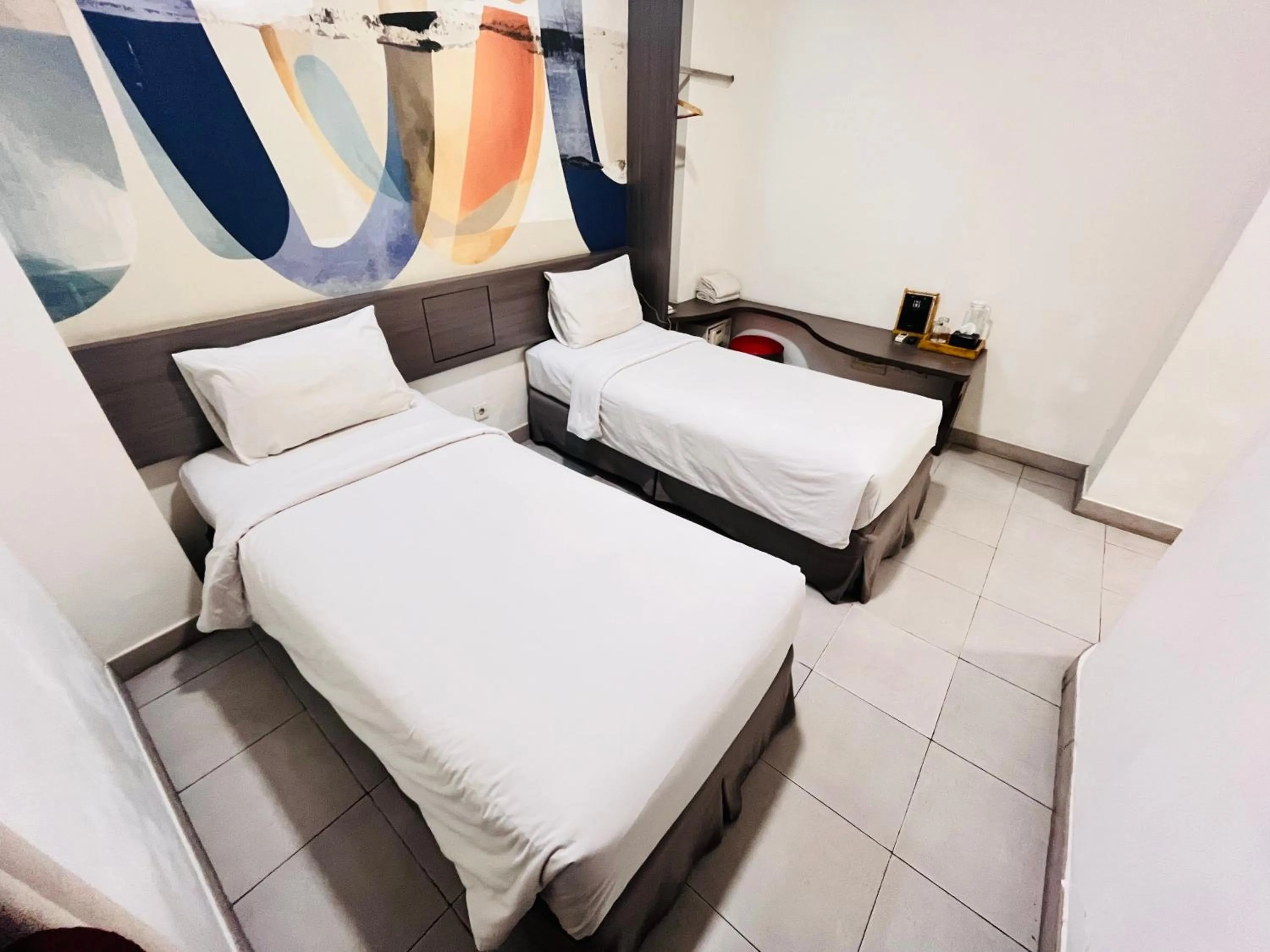 Bedroom, Bed in Hotel 88 Kedoya Jakarta