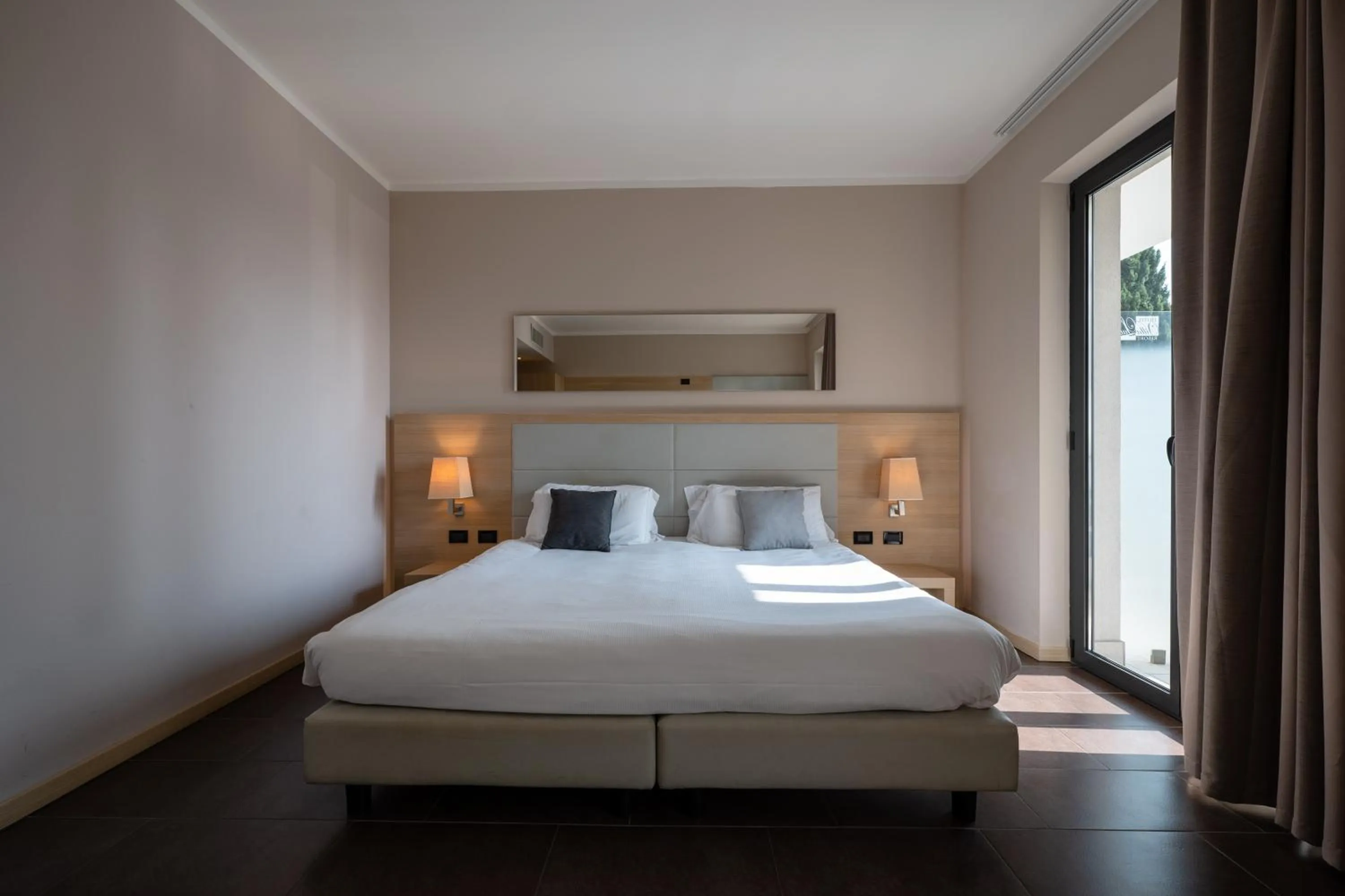 Bed in Villa Luisa Resort & Luxury Apartments