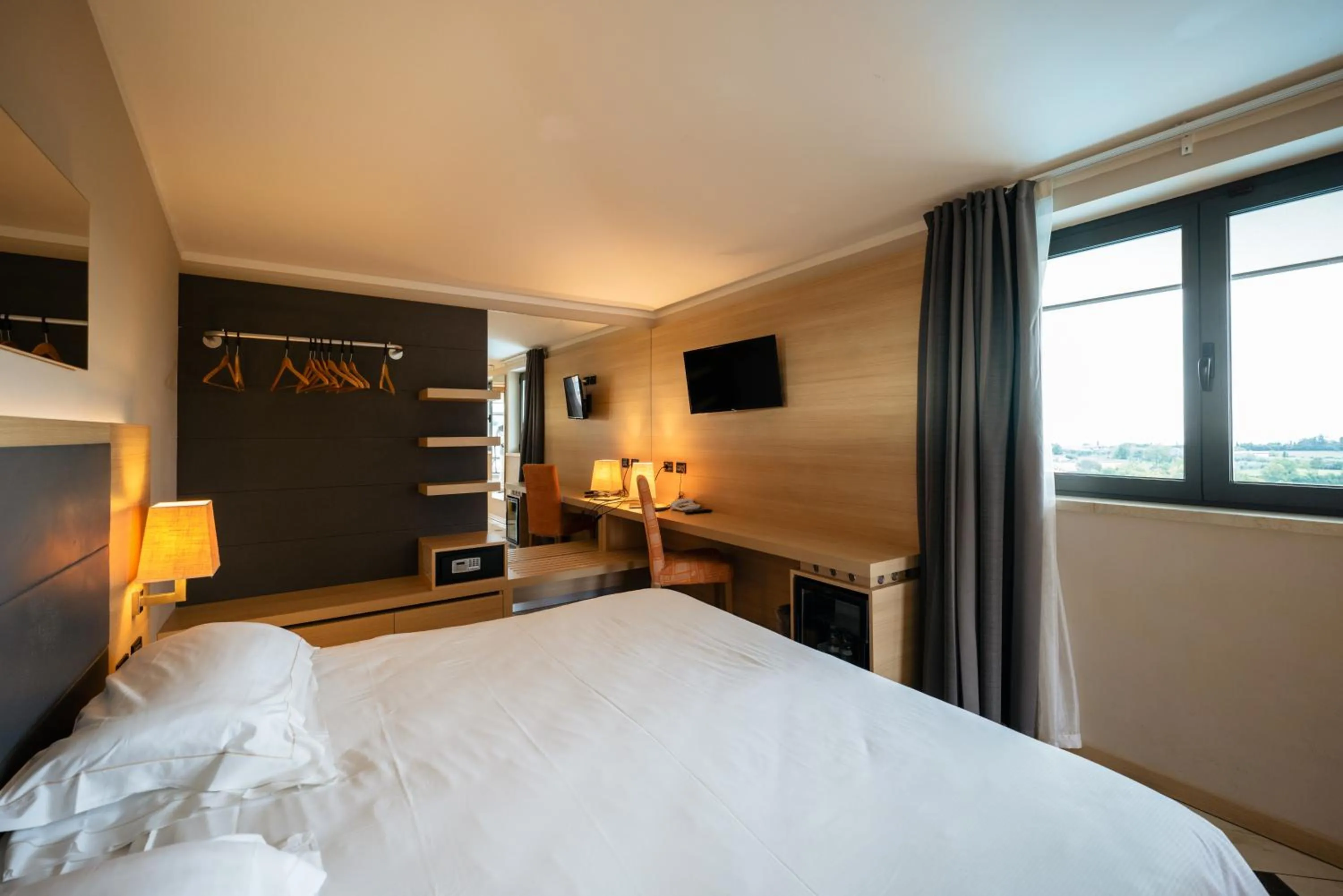 Bed in Villa Luisa Resort & Luxury Apartments