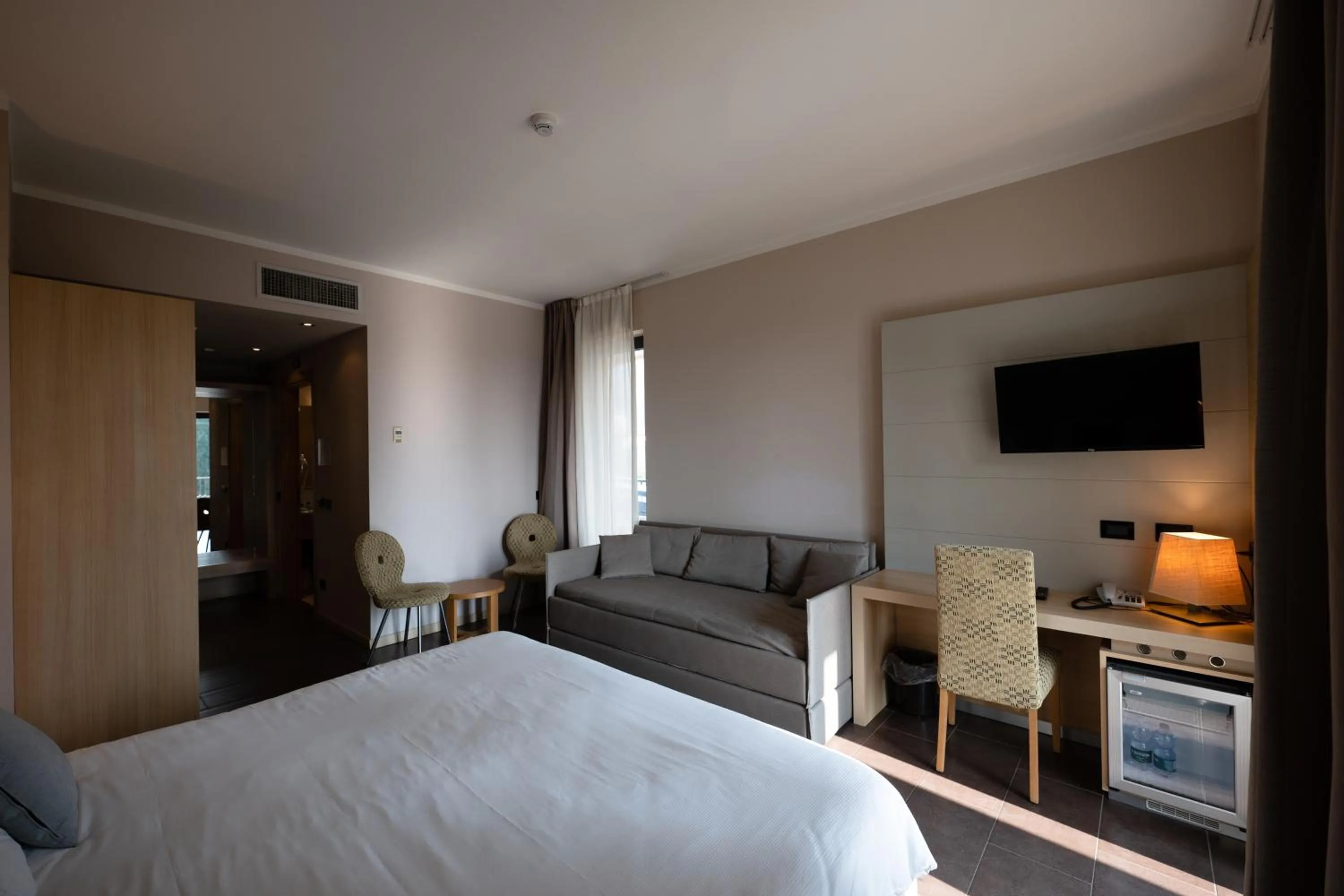 Bed in Villa Luisa Resort & Luxury Apartments