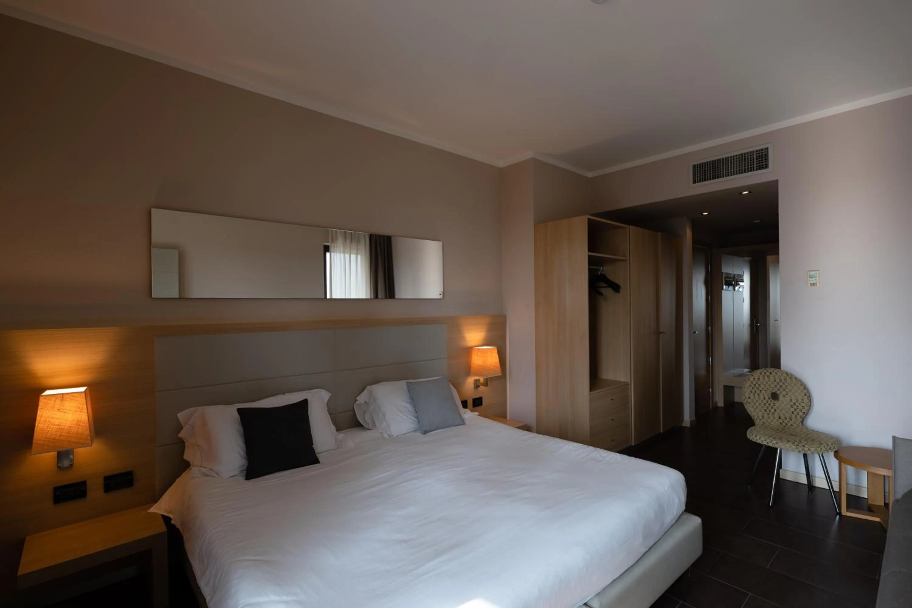 Bed in Villa Luisa Resort & Luxury Apartments