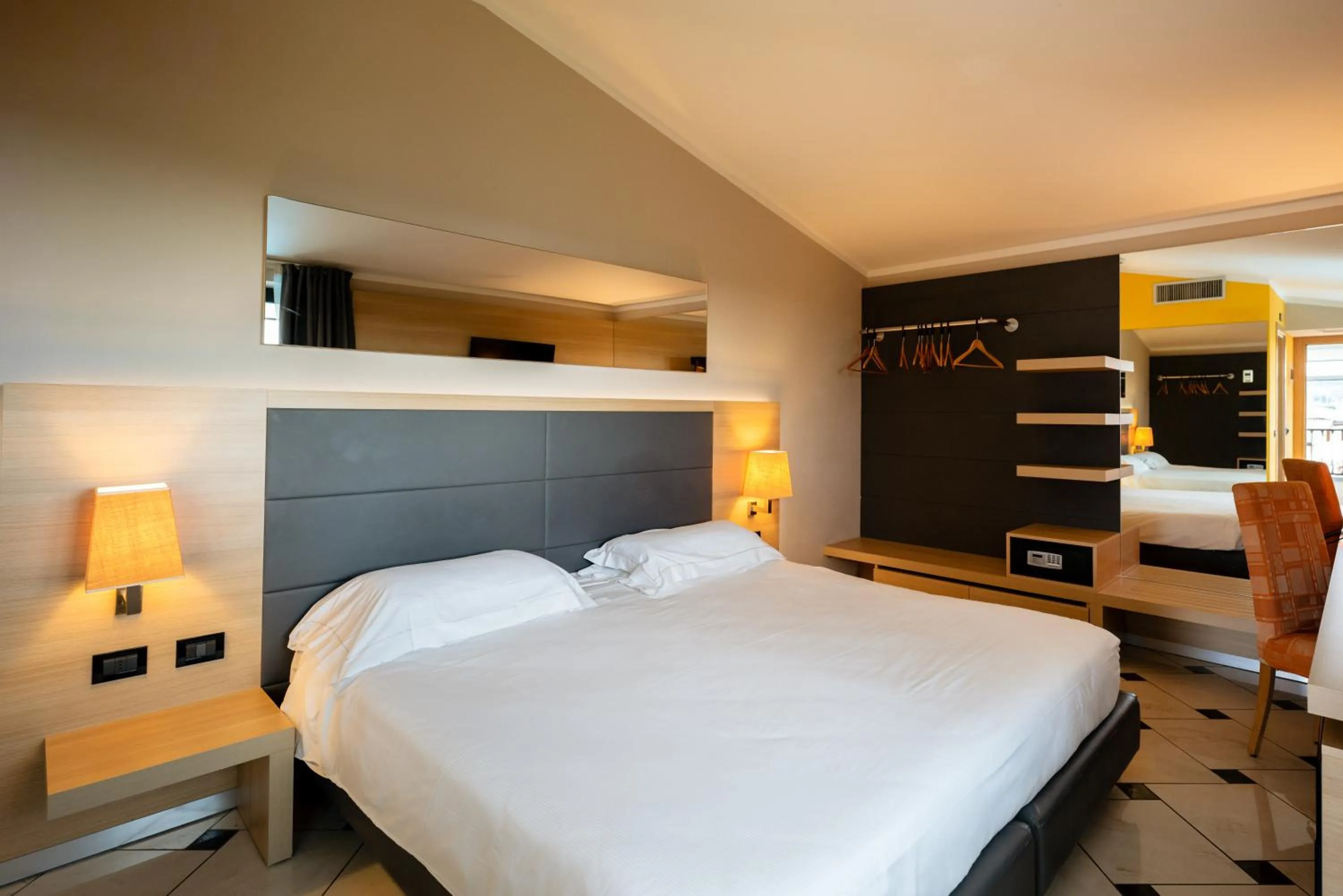 Bed in Villa Luisa Resort & Luxury Apartments