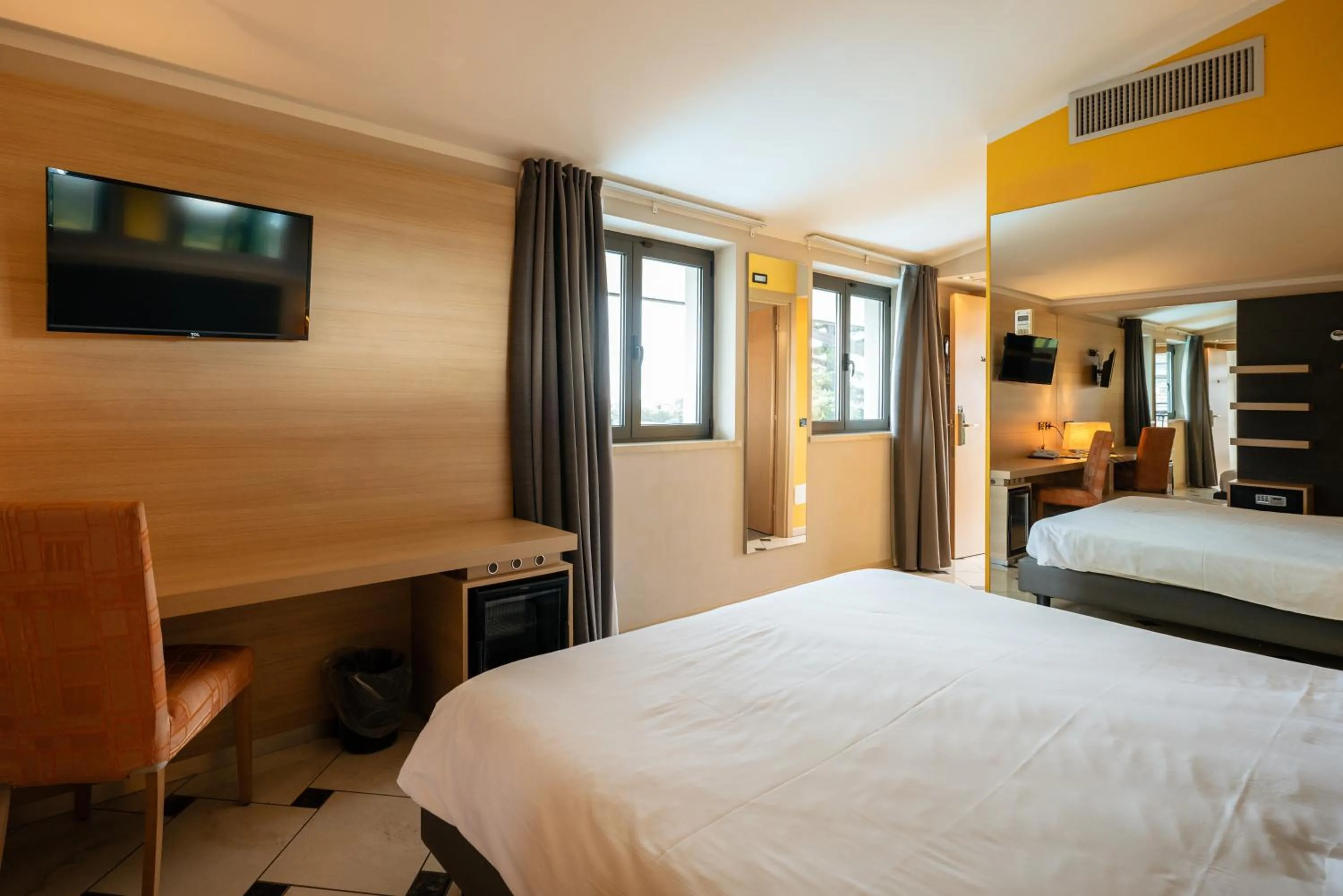 Bed in Villa Luisa Resort & Luxury Apartments