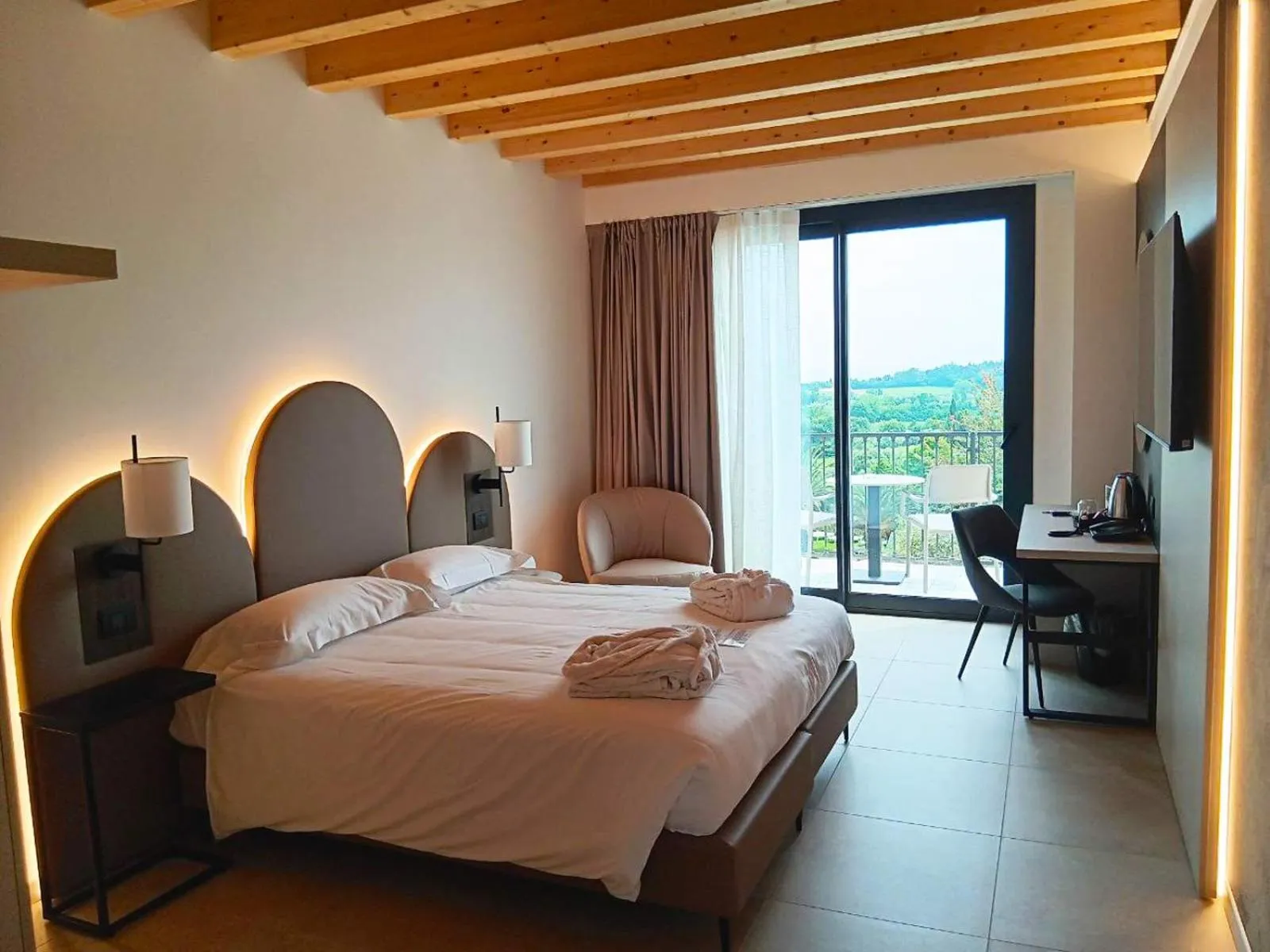 Bed in Villa Luisa Resort & Luxury Apartments