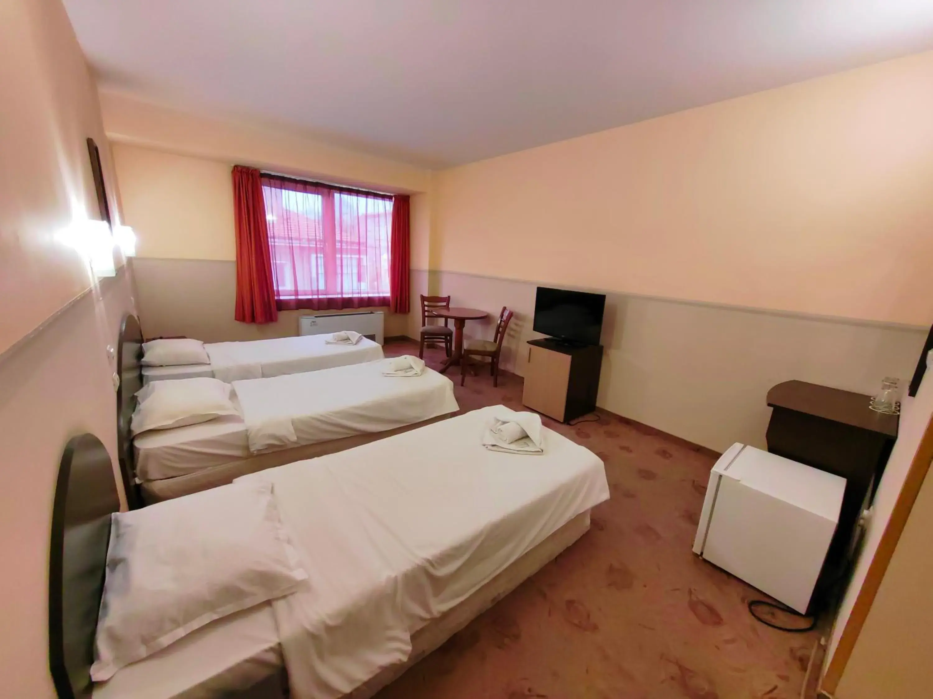 Triple Room in Hotel Akvaya Triple Room in Hotel Akvaya