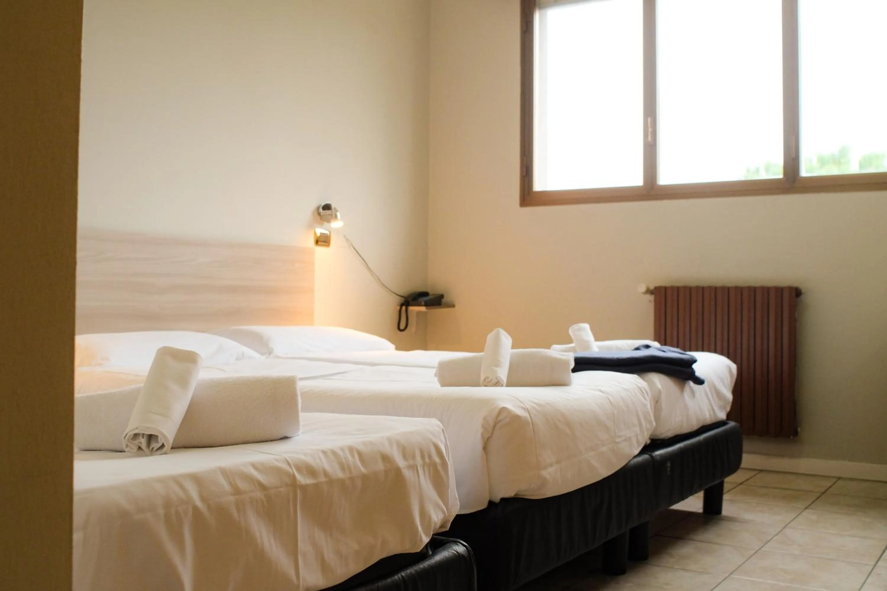 Bed in Hotel Brianza