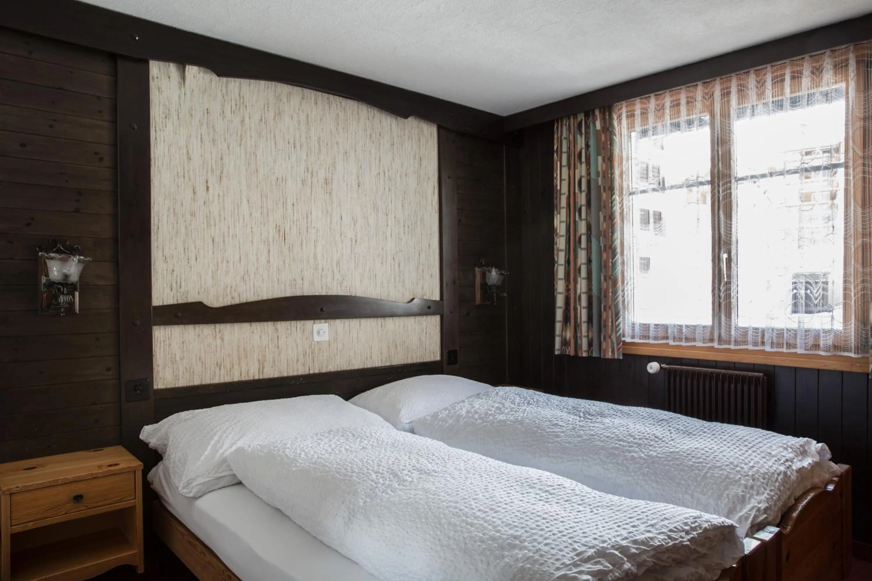 Bedroom, Bed in Hotel Burgener