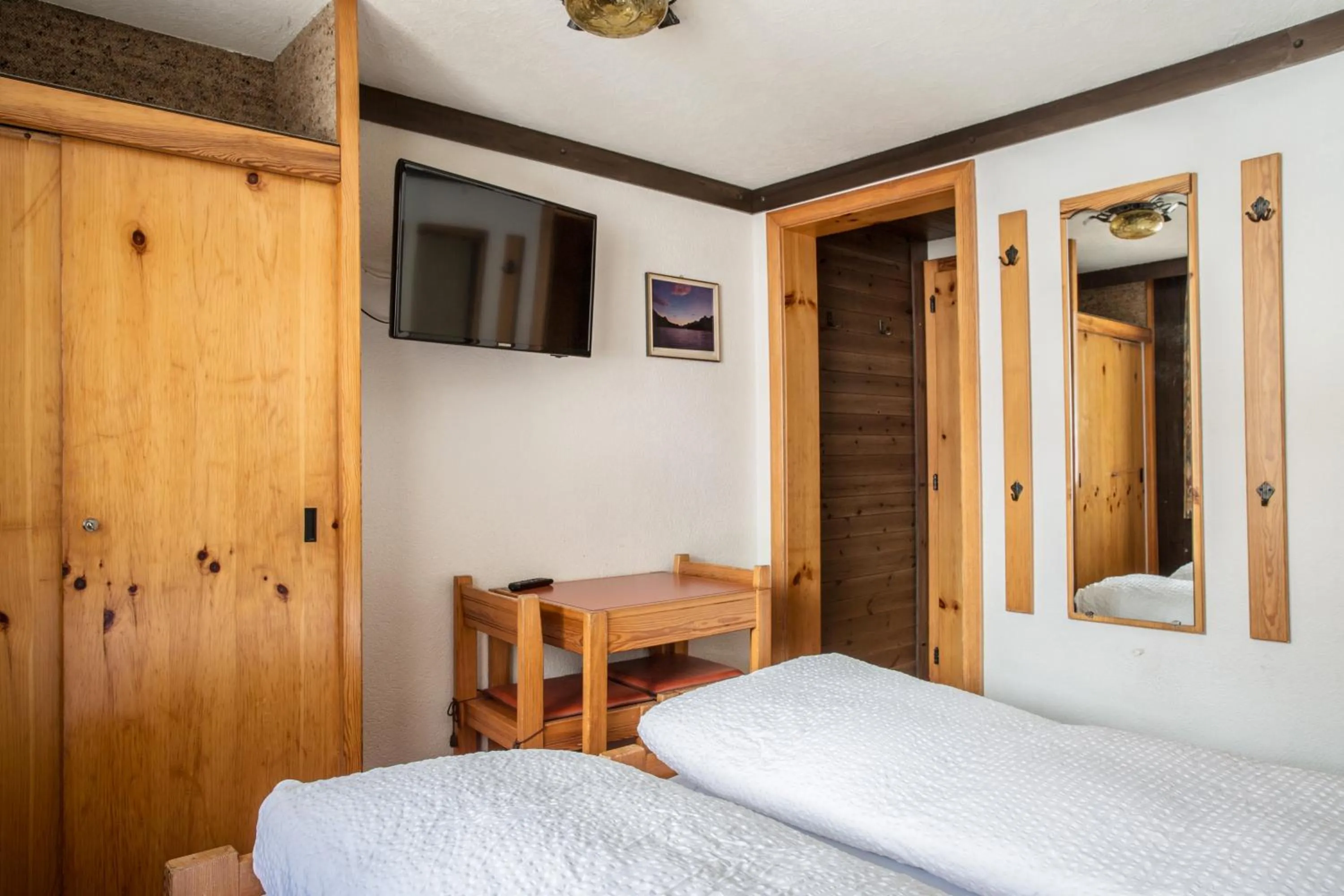 Bedroom, Bed in Hotel Burgener