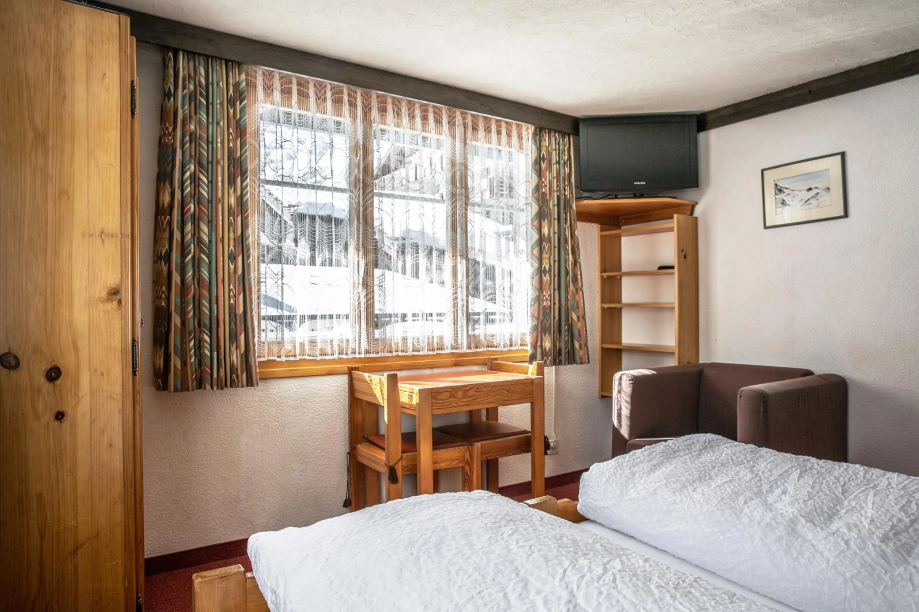 Bedroom, Bed in Hotel Burgener