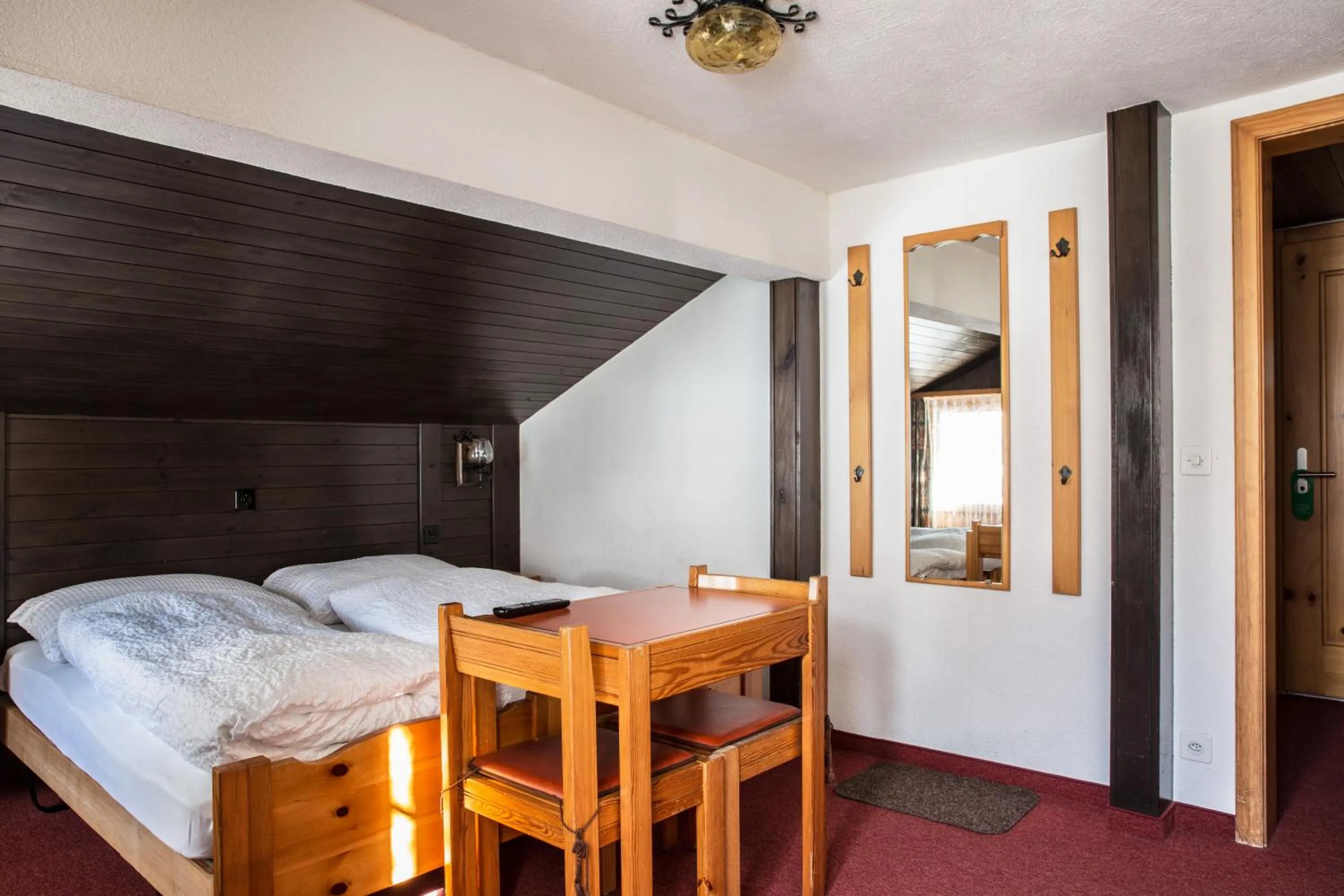 Bedroom, Bed in Hotel Burgener