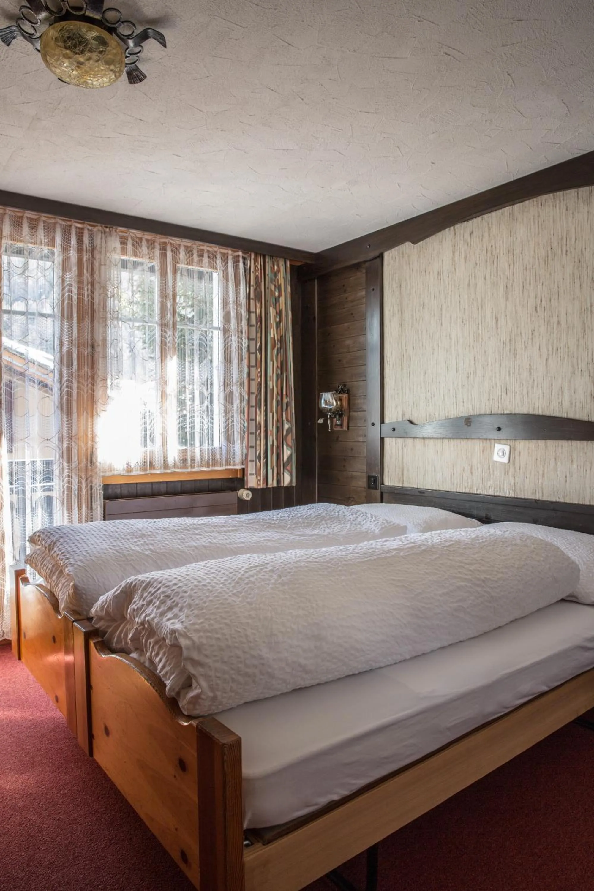 Bedroom, Bed in Hotel Burgener