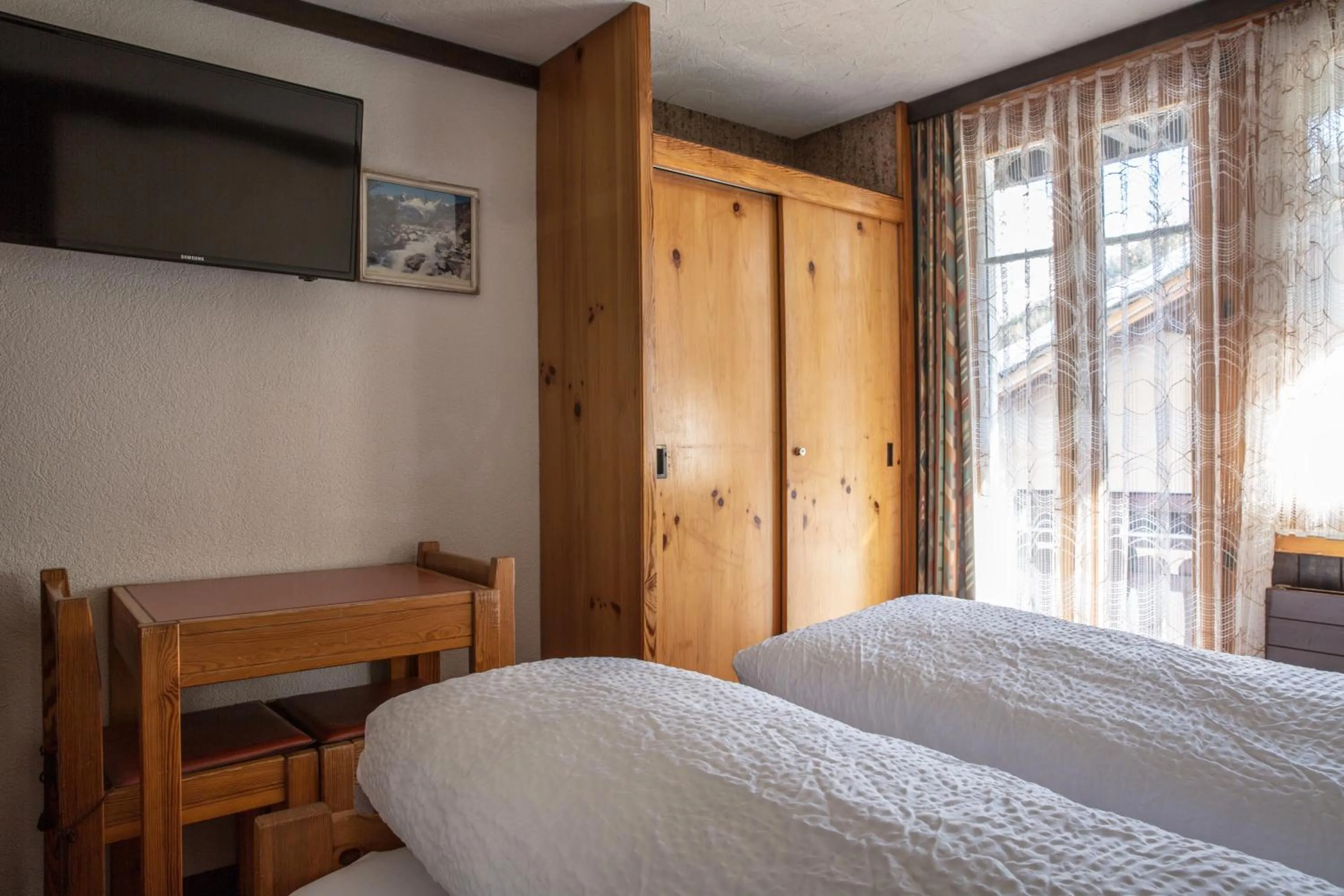 Bedroom, Bed in Hotel Burgener