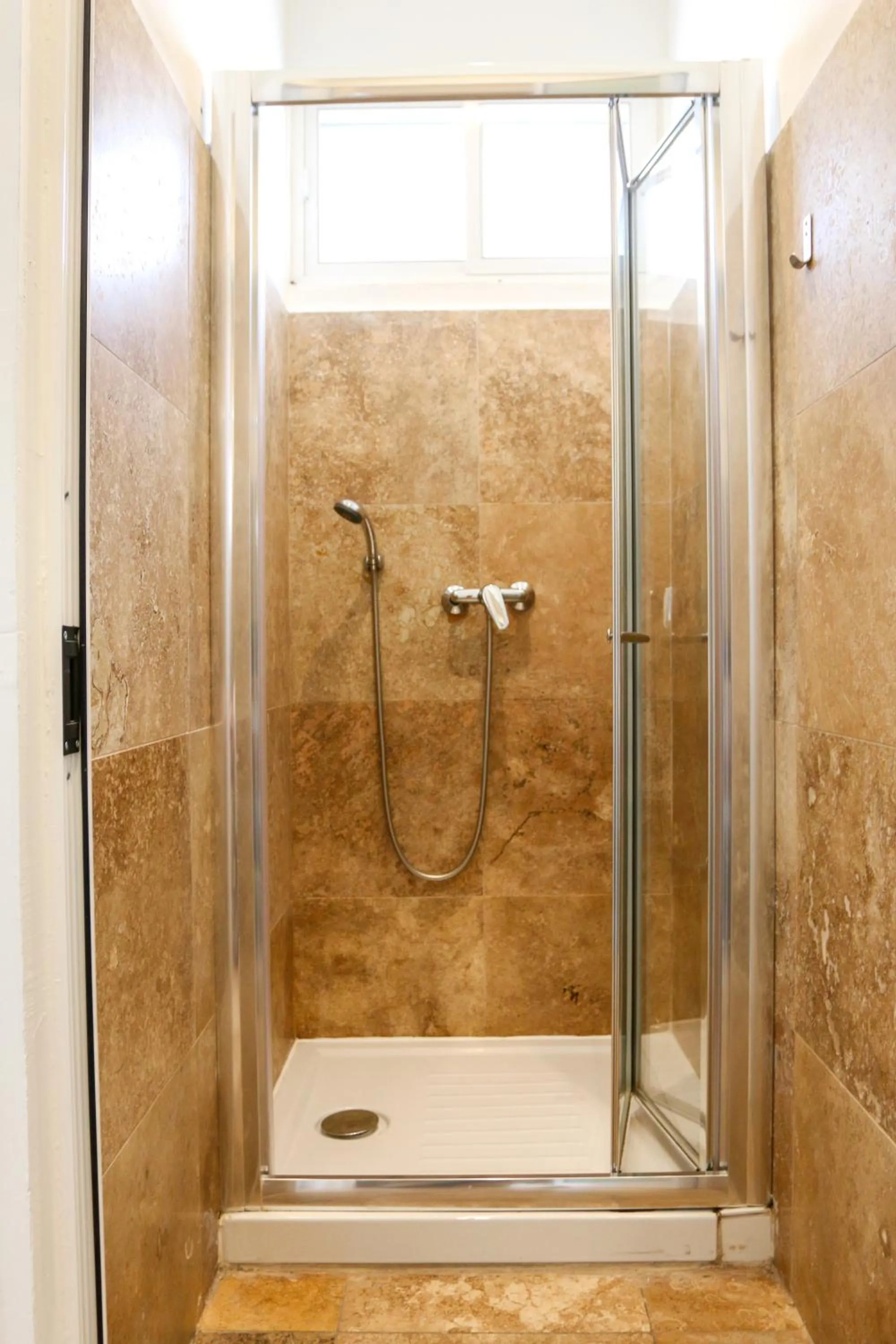 Shower in Follow the Sun Boutique Hostel - Pool, Breakfast & Sea Views