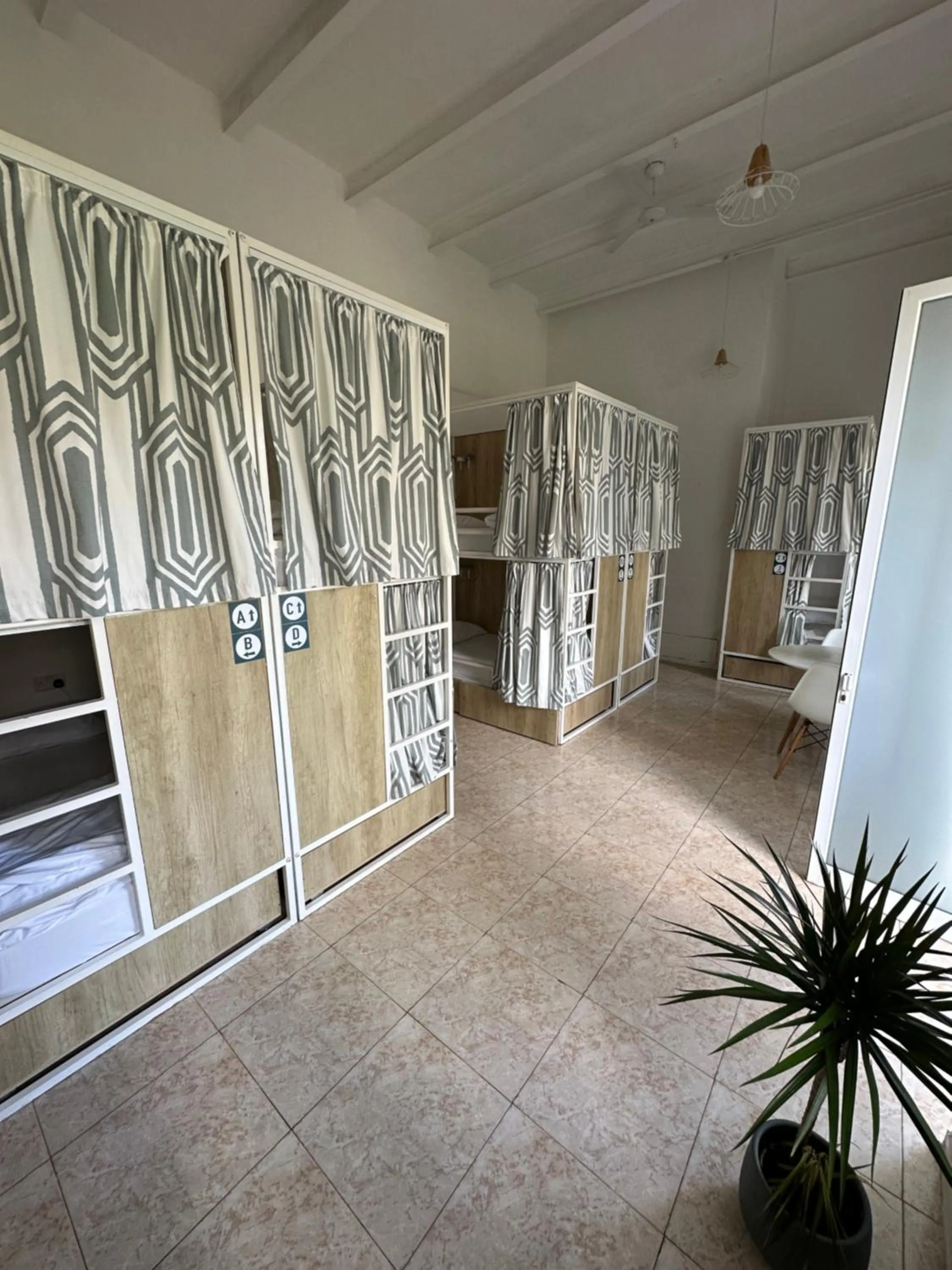 Bedroom in Follow the Sun Boutique Hostel - Pool, Breakfast & Sea Views