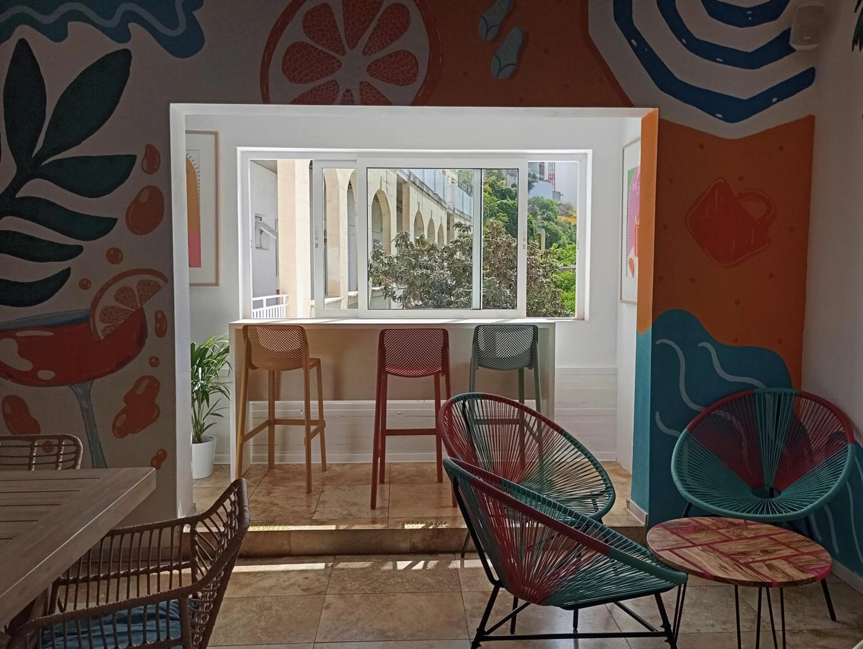 Seating area in Follow the Sun Boutique Hostel - Pool, Breakfast & Sea Views