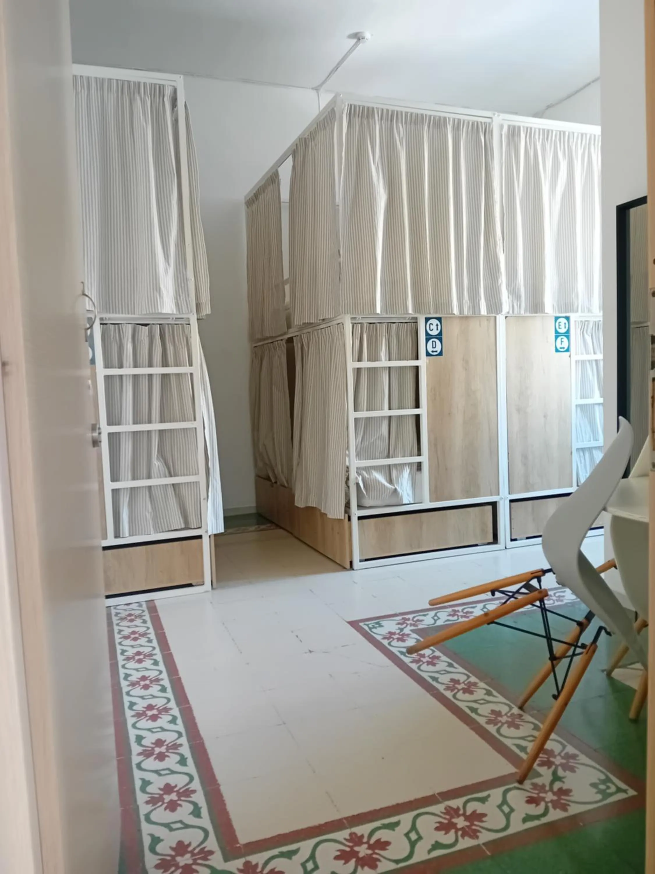 Photo of the whole room in Follow the Sun Boutique Hostel - Pool, Breakfast & Sea Views